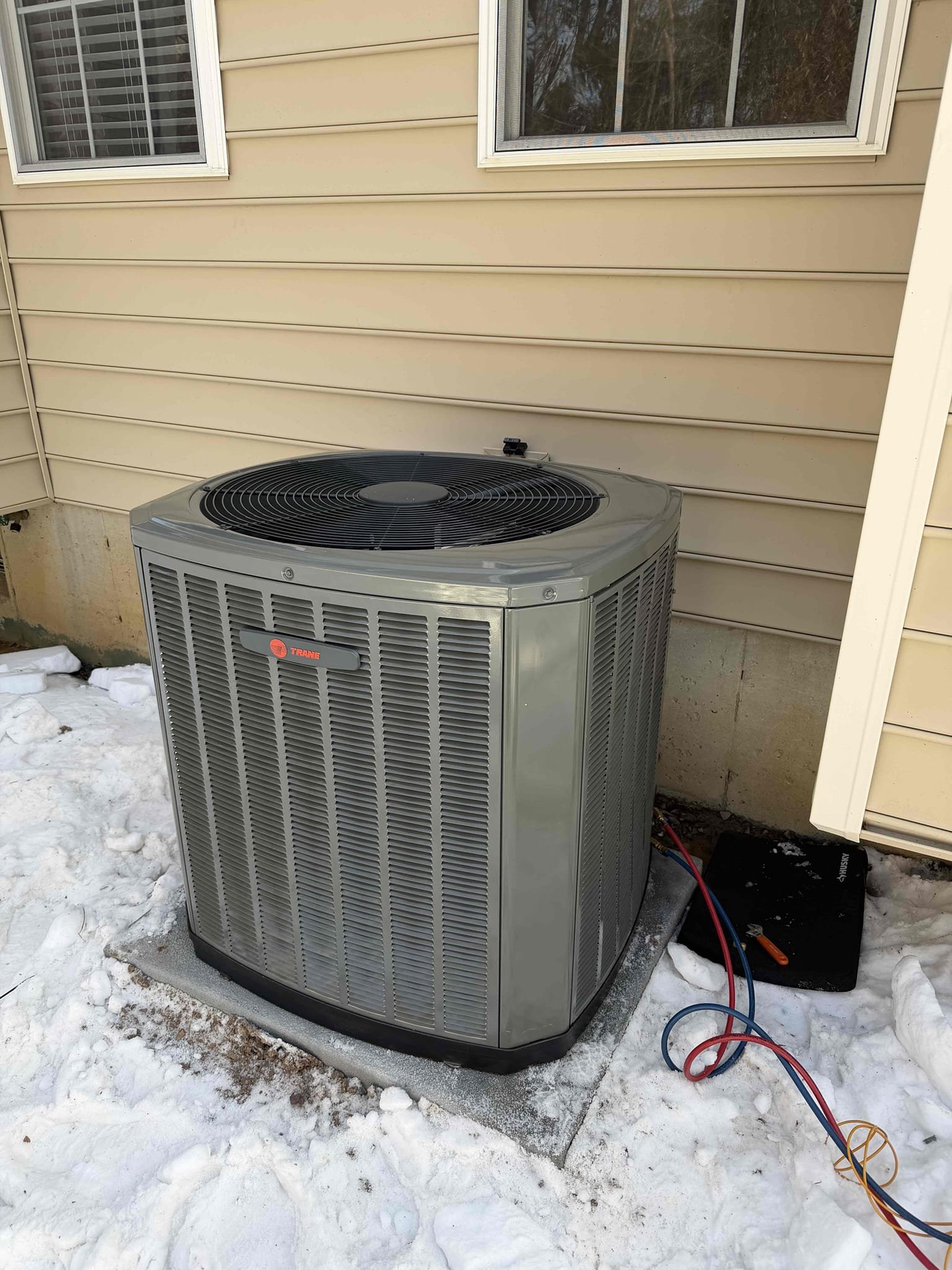 Recovered refrigerant and removed and disposed of old equipment.  Installed new Trane furnace and air conditioner on new pad and leveled.  Completed all metal work to furnace and ran new vent system in 3" pvc from furnace to outdoors with flush termination kit.  Connected all mechanical and electrical connections to indoor and outdoor units.  Tested furnace operaiton.

We will need to return to install new dampers, zone panel, and thermostats.

2/10/26
Conner and Barry
Installed (2) New zone dampers (1) 8x12 and (1) 8x18 there is one more zone valve that is still original (8x12 for backside trunk of zone 2 second floor zone). Will talk to management about price and replacement of this one. 
Installed new Zone panel and configured 
Installed (2) HoneywellS1200 thermostats, configured for high efficiency gas heat 2-stage. 

There is one room sensor she can chose to link to either of the (2 thermostats). She may use for first floor because there is lots of sunlight beating down on thermos