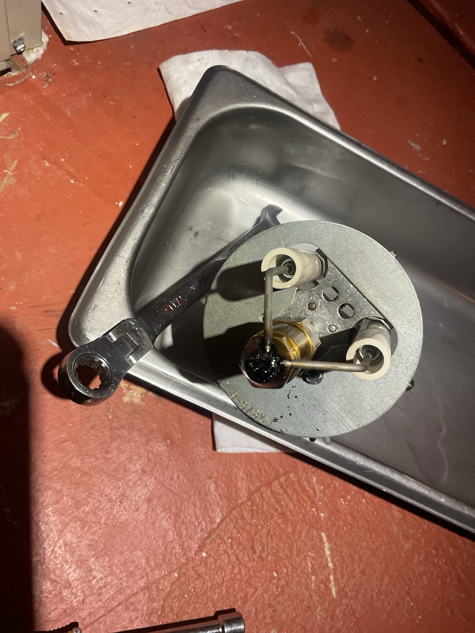 Completed heat tune up for sporit oil furnace.

He noticed humidity was low pad was dry. humidifier was not properly wired in or tested. Fixed wiring and tested today. Humidifier is not leaking and condensate pump is discharged to a freeze proof spot. 

Filter is washable. Clean. 
Cleaned heat exchanger and inspected flue piping and chimney. There is no liner in chimney.
Replaced spin on oil filter, strainer with gasket and nozzle. Nozzle was slightly clogged. With new nozzle system is much quieter.
Verified oil pump pressure 120 psi, 
Inspected electrode condition and alignment, transformer, cad cell eye, and air bands for debris. 
Inspected wiring, controls, electric motors and components including fan speeds. 

Combustion, smoke and draft tests: Pass

Oil furnace. operating well at this time. 

Did not charge for spin on oil filter considering we improperly wired humidifier and never tested. But he knows on future visits there is a charge for oil filter.