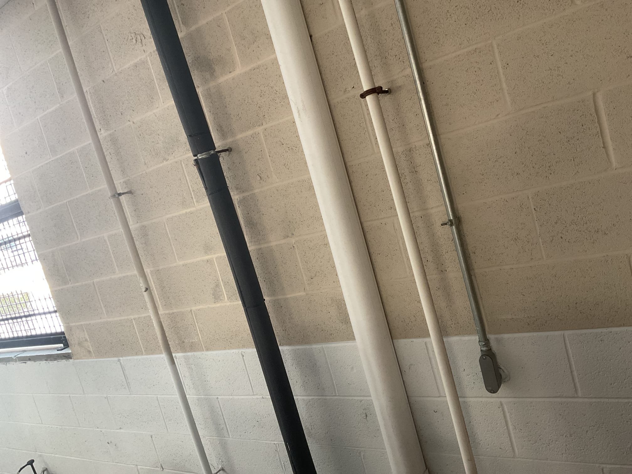 Fully assessed water leaking from condensation pipe situation. After further investigation found 2” drain pipe frozen. Found heat tape not working. Maintenance wanted to flush the drain with water from first floor water heater. Explained to them that there could be frozen pipes further up the line. Was able to get water to un thaw for now. Wayne is going to try to get the heat tape working. Gas furnace is working at time of service. 