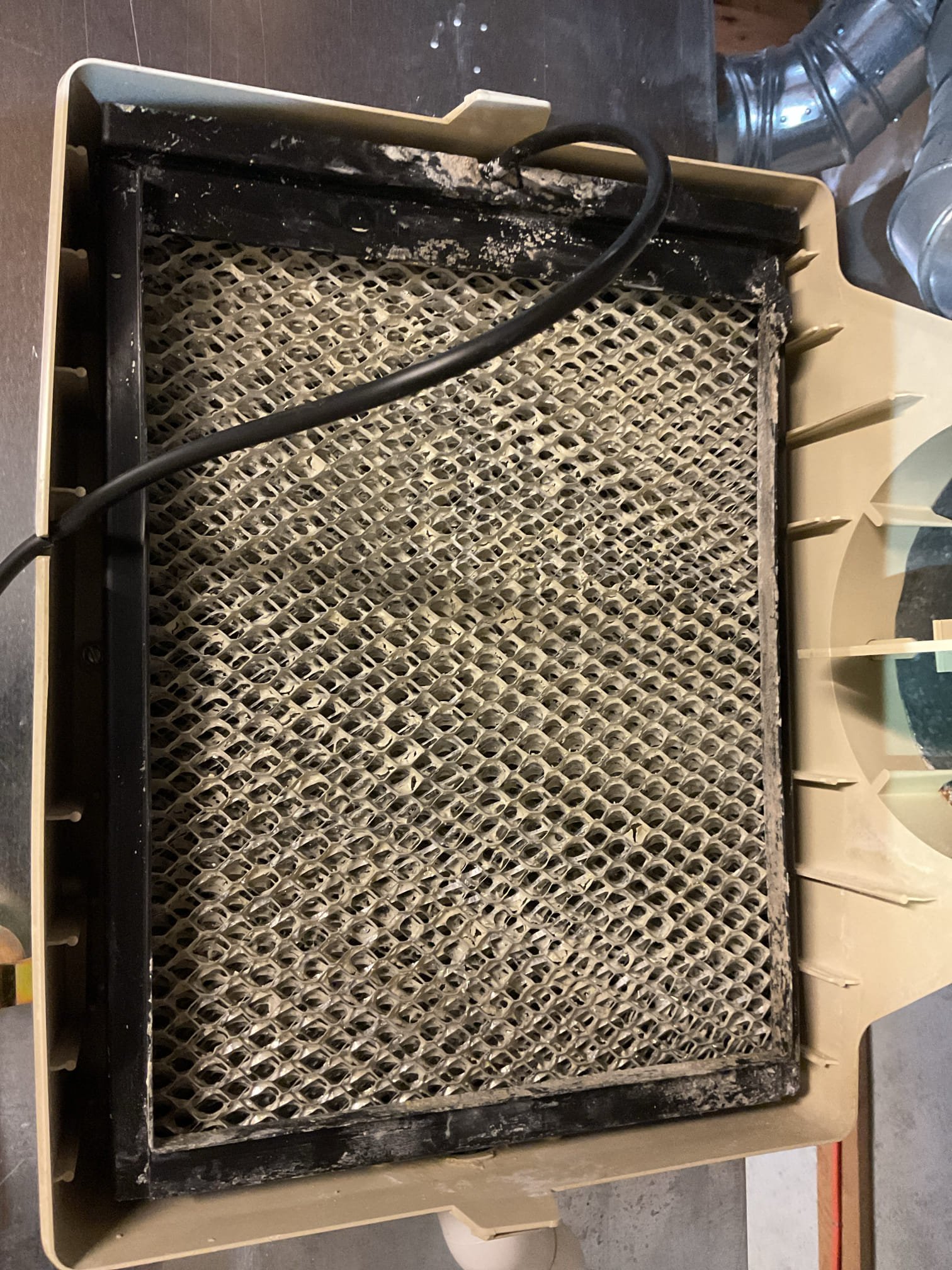 I arrived to look at the customers thermostat and eim control. He doesn’t believe the humidifier is working. Went through the thermostat settings and found everything was OK. Check the EIM board that looks OK could’ve been some kind of error on the thermostat, but the humidifier is working. Did recommend to the customer about replacing his outer casing for the water panel in the top starting to calcify to a point of replacement. No charge warranty.