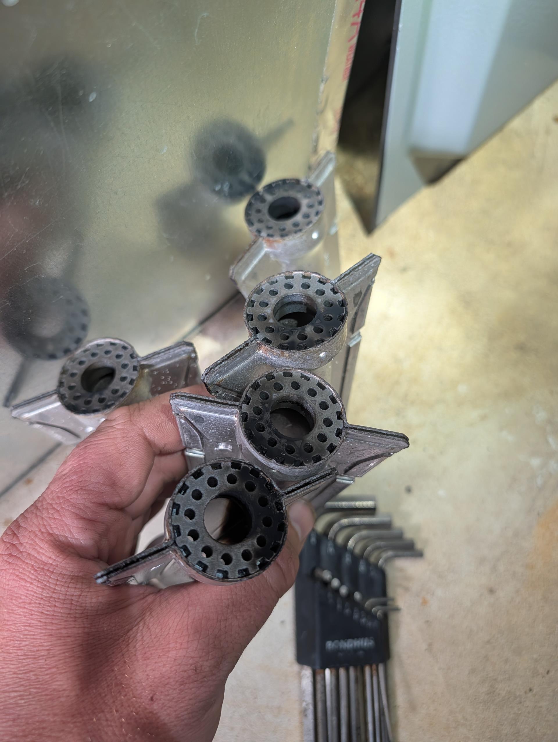 No heat Daikin propane furnace.
Homeowners allowed propane to get to empty.
Found furnace locked out on E3 “Open Limit”
The right side rollout switch was open. 
This can be caused by low propane pressure during operation.
Found burners with black marks on fav and flame sensor with black soot. All of these things are the result of an under-fired (not enough fuel) furnace.

Provided email estimate to install LO propane pressure switch so that the furnace does not run if inlet propane drops below a designed point. 

Cleaned and tested flame sensor. 
Verified inlet and outlet gas pressures. Found low fire (1st stage) pressure to be a tad high. Lowered to 6”. Hi fire pressure Good 9.5”

Recommend upgrading burners to stainless steel. Provided email estimate to do this. 

Also provided estimate for both recommended repairs + plan membership. 

Told homeowner that I could smell faint smell of propane when I walked into the house. I soaked all the furnace gas piping and fittings from the shut 