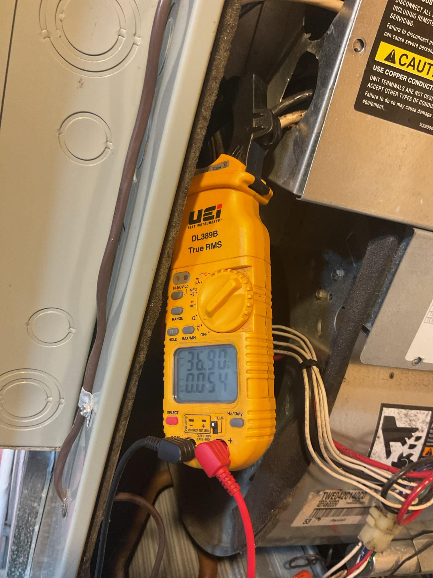 Completed heat tune up for 3.5 ton R22 heat pump with 20KW electric heat kit,
Installed 11/15/04 21 years old 

20x20x1 filter ok
Indoor and outdoor coils in good condition.
Inspected wiring, controls, electric motors and components. 20KW electric heat amp draw 85A ok. Thermostat cannot be configured to control electric auxiliary heat us. Provided email estimate for WiFi thermostat which will result in savings. 
Told him he can leave the top breaker on the service disconnect at indoor equipment off to downsize the heat kit to 10KW. If he feels uncomfortable he will turn back on. 
Measured temperature rise and static pressure
Inspected drains. There is no trap or overfill protection switch on drain line. Provided estimate for EZ trap. Also provided estimate for wet switch/flood safety 
Verified integrity of compressor and defrost cycle ok.
Checked refrigerant charge/pressures. R22 198/36 ok. 

Heat pump operating ok at this time, but is well beyond Replacement age. Also lacks control of