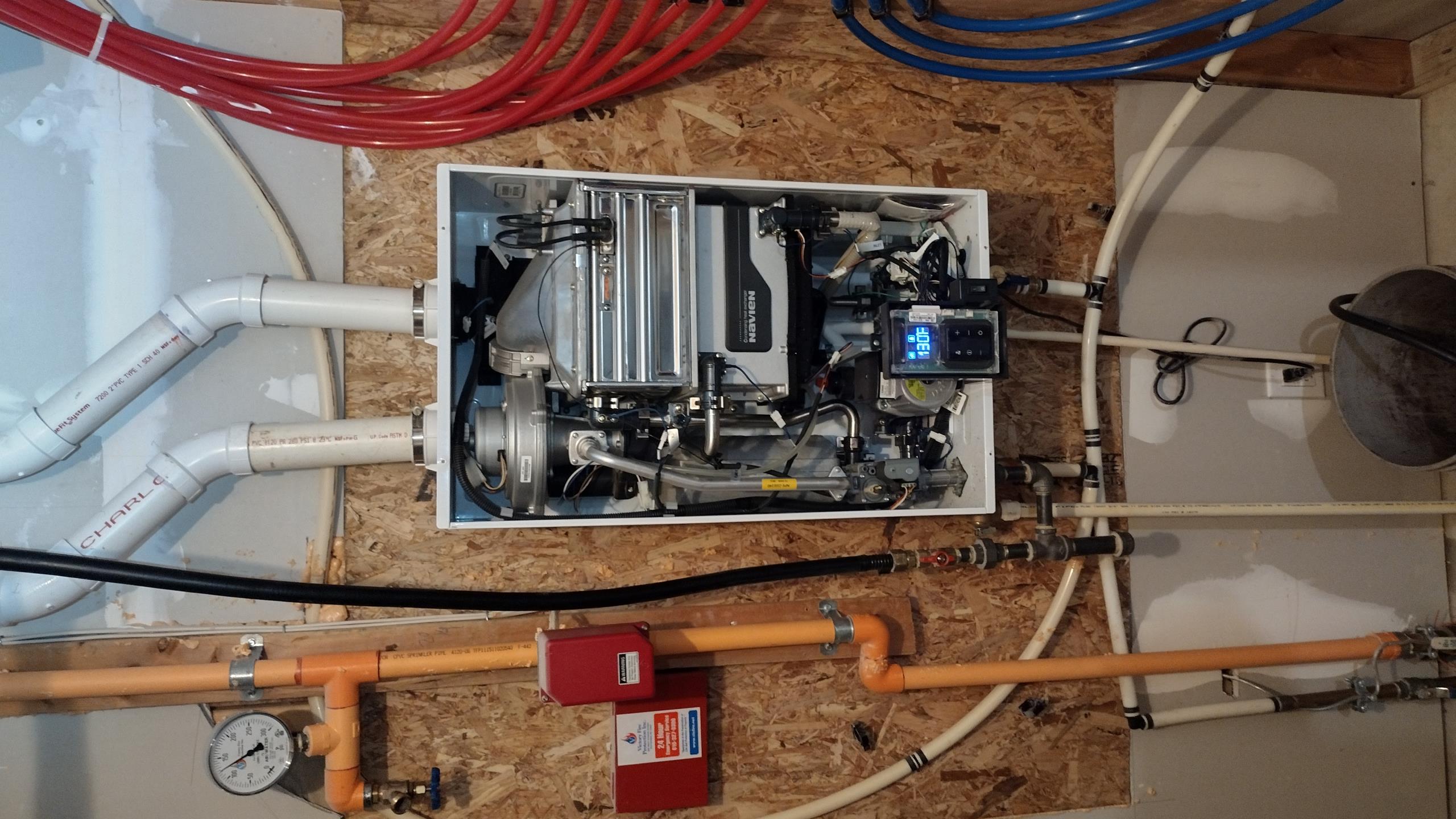 Luis 2-16-26 customer called in for no hot water, tankless navien not providing enough hot water. I check inlet filter ok no error codes showing, I contact tech support and they said before any further troubleshooting, flushing is necessary. We need to come back to perform tankless flush then we can further troubleshoot unit, there is a chance unit just needs flushing and will work fine. We will check operation after flushing. No expansion tank and pressure reducing valve are installed. We will need 90 fitting to connect to the hot water connection. See photos. Water pressure is 90 psi. I provided estimate to install pressure reducing valve and expansion tank.