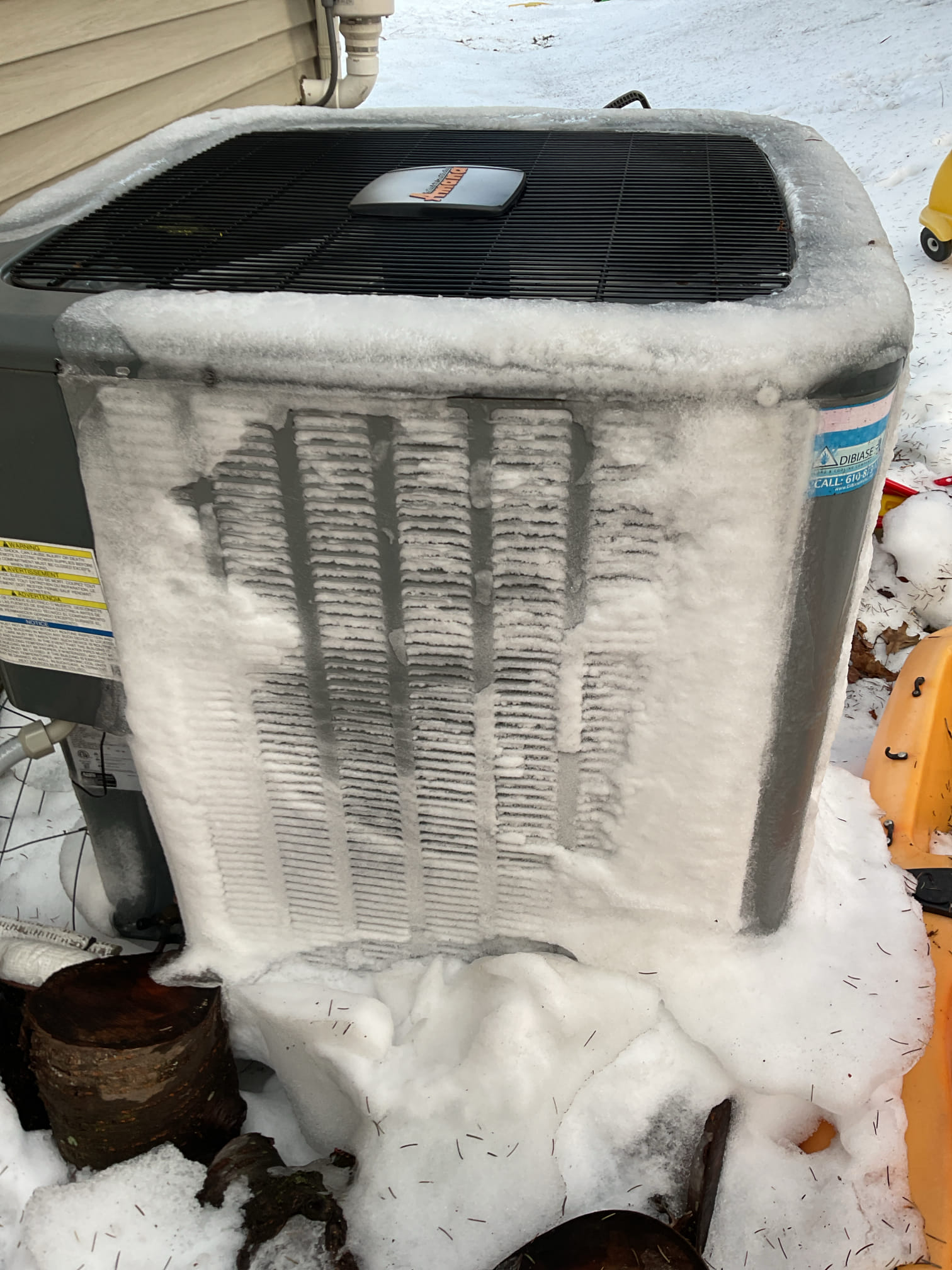 I arrived for no heat on a heat pump. The outdoor unit is completely frozen over. I pulled the disconnect on the outdoor unit so it won’t try to run anymore. Customers can use their indoor auxiliary heat for the meantime this system needs to defrost before we come back and re-diagnose what causes the freeze up, the customers will speed up the process by warm water on the outdoor unit and I believe tomorrow’s gonna be roughly 50°. I collected for my diagnostics . 