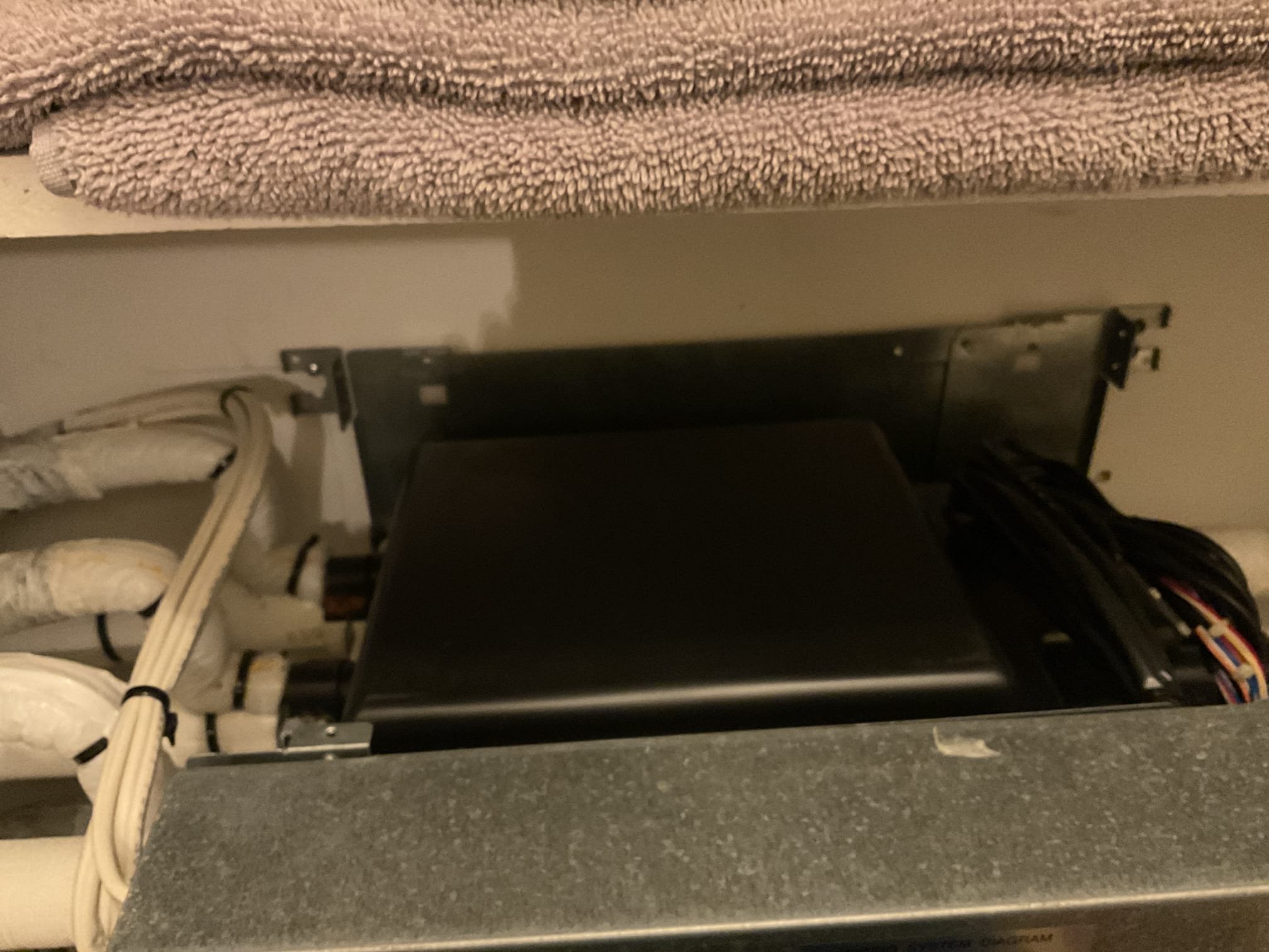 Fully assessed (4) head Fujitsu mini split heat pump system. Homeowner opened up linen closet there are (2) brace boxes inside. Did smell the electronics smell. Explained to customer that all I can do is perform a visual inspection of brace boxes. Which the way they are mounted you can’t open up the bottom brace boxes. System is around 10 years old would recommend getting a price on replacement of mini split system. Looked over what I could see and didn’t see anything burnt but can’t do a full inspection the way they were installed. Heat pump is heating properly at this time. 