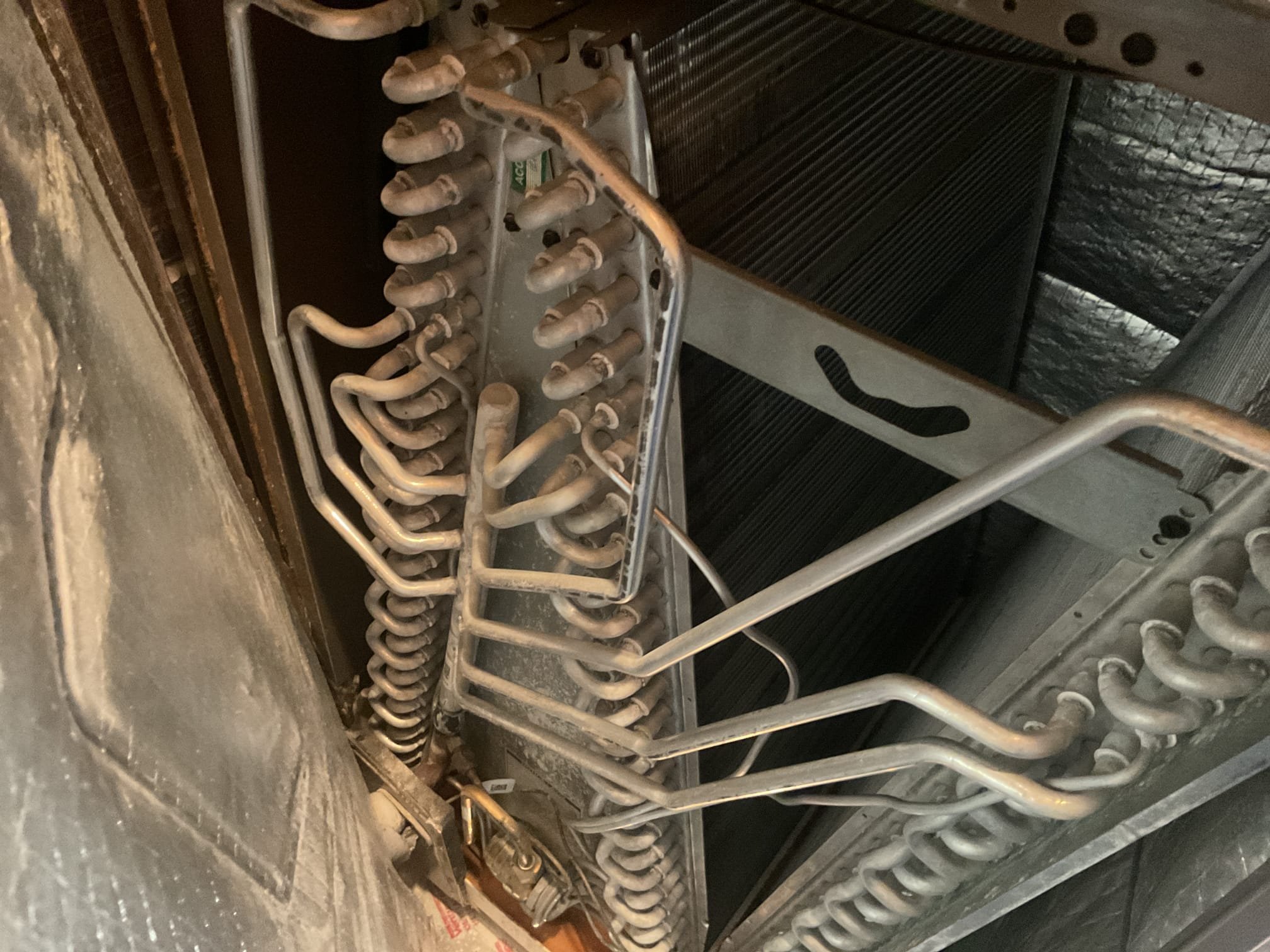 Fully assessed heat pump, not heating. Found 2016 Luxaire heat pump running on auxiliary heat only. Went out to outside heat pump and found heat pump locked out on a code 5 low pressure lock out. Hooked up gauges and found heat pump flat on charge. Found oil around outside coil. Also found compressor was replace and discharge pipping is almost kinked shut. Showed homeowner all of this. Explained to him that more than likely we can’t get this outdoor coil any more and also the way the compressor was replaced was not the best. For these reasons I recommend replacing heat pump system. Homeowner is going to talk to his father before making any decisions. He will call us to set up an appointment to have someone come out to give a replacement estimate. 




