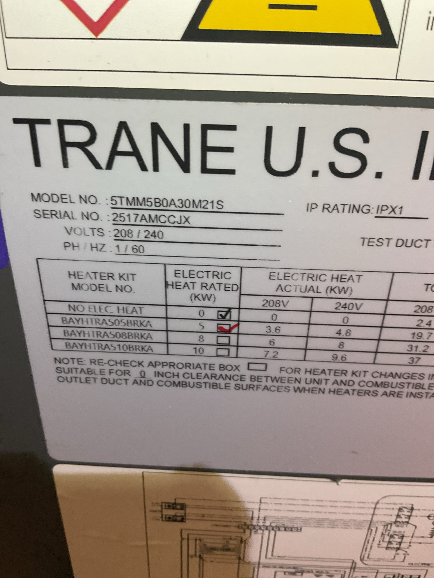 Blown transformer and 3A fuse.
Caused by improper wiring.
The W contacts from thermostat were not wired to the 11 terminal on the relay but instead to one of the “CC” contacts of the refrigerant mitigation board.
In these thru-the-wall air handlers the white conductors from the unit ARE NOT the electric heat contacts. One factory WHITE conductor is wired to the Y conductors from thermostat and outdoor. The other factory WHITE is wire nutted to factory GREY. A field provided conductor from the 11 terminal on the relay needs to be land on white to thermostat W(electric heat) see wiring diagram.

Installed new transformer wired from 208V primary. Made all necessary wiring connections.

After starting unit the mitigation board had a 2 flash communication error. Or refrigerant detected. Initially I found the 4 pin connector detached from the sensor! Re attached. This is no small task. Current sensor is mounted to a nearly in accessible spot.  Very difficult to get harness clicked back in.

