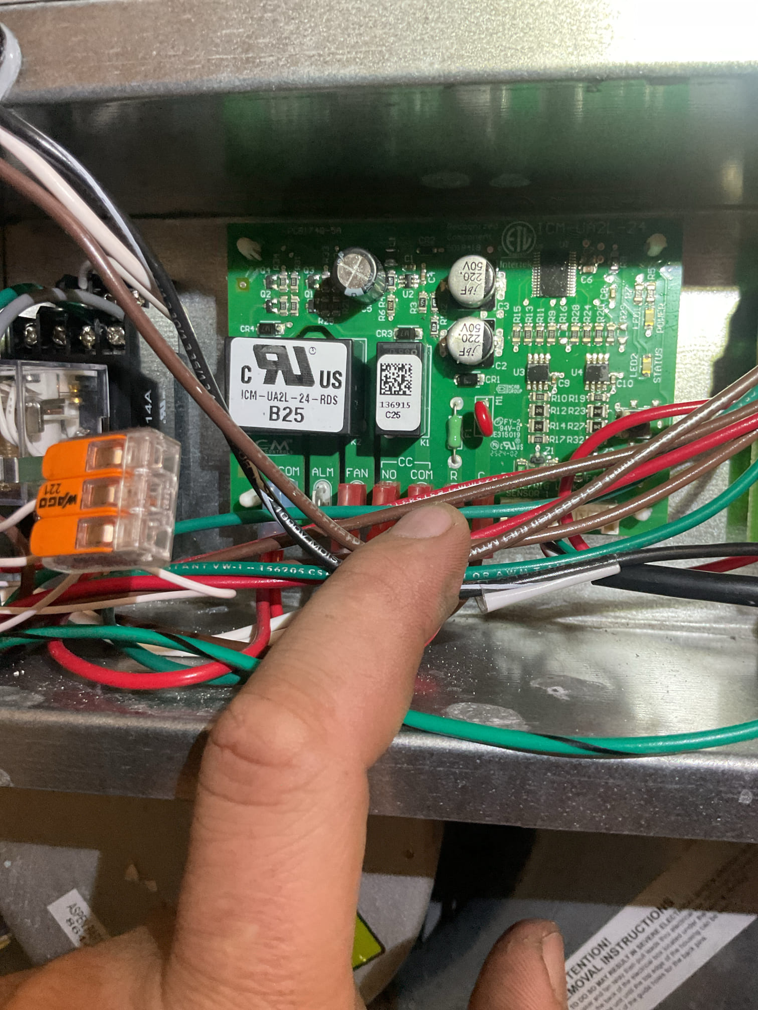 Blown transformer and 3A fuse.
Caused by improper wiring.
The W contacts from thermostat were not wired to the 11 terminal on the relay but instead to one of the “CC” contacts of the refrigerant mitigation board.
In these thru-the-wall air handlers the white conductors from the unit ARE NOT the electric heat contacts. One factory WHITE conductor is wired to the Y conductors from thermostat and outdoor. The other factory WHITE is wire nutted to factory GREY. A field provided conductor from the 11 terminal on the relay needs to be land on white to thermostat W(electric heat) see wiring diagram.

Installed new transformer wired from 208V primary. Made all necessary wiring connections.

After starting unit the mitigation board had a 2 flash communication error. Or refrigerant detected. Initially I found the 4 pin connector detached from the sensor! Re attached. This is no small task. Current sensor is mounted to a nearly in accessible spot.  Very difficult to get harness clicked back in.


