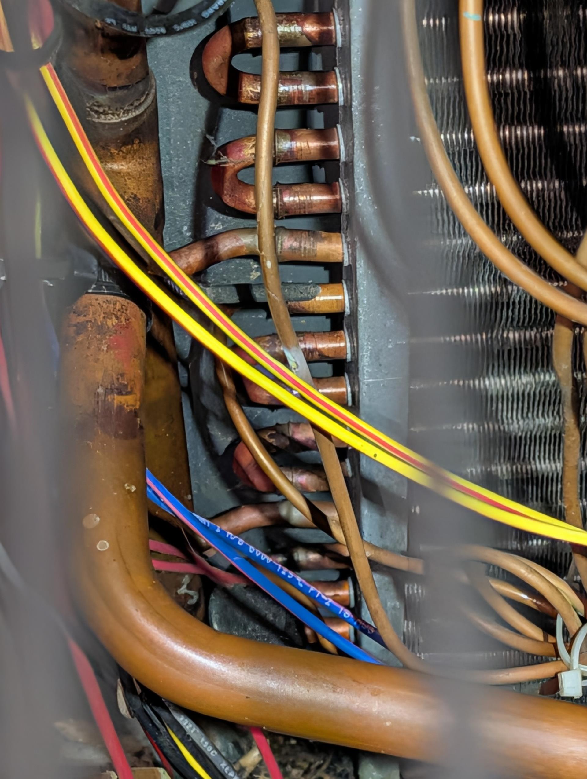 Completed heat tune up for heat pump with 10KW electric heat kit,

Replaced 20x20x1  filter
Indoor and outdoor coils in good condition.
Inspected wiring, controls, electric motors and components. 10KW electric heat kit 38A: Good; provided email estimates for surge protectors
Measured temperature rise and static pressure
Inspected drains. There is no trap or overfill protection switch on drain line. Provided email estimate for EZ trap with float/overfill protection switch. 
Verified integrity of compressor and defrost cycle 
Checked refrigerant charge/pressures.

Noticed humidifier pad was dry and clean. Ultimately found that the saddle valve is seized. I was able to exercise the piercing valve which opened the valve to get flow to humidifier. Recommend replacing this valve with a 1/4 turn ball valve style feed. Provided email estimate. 

There is some microbial growth at indoor AC coil. Provided email estimate for UV light system that will control this. 

Heat pump operating well at th