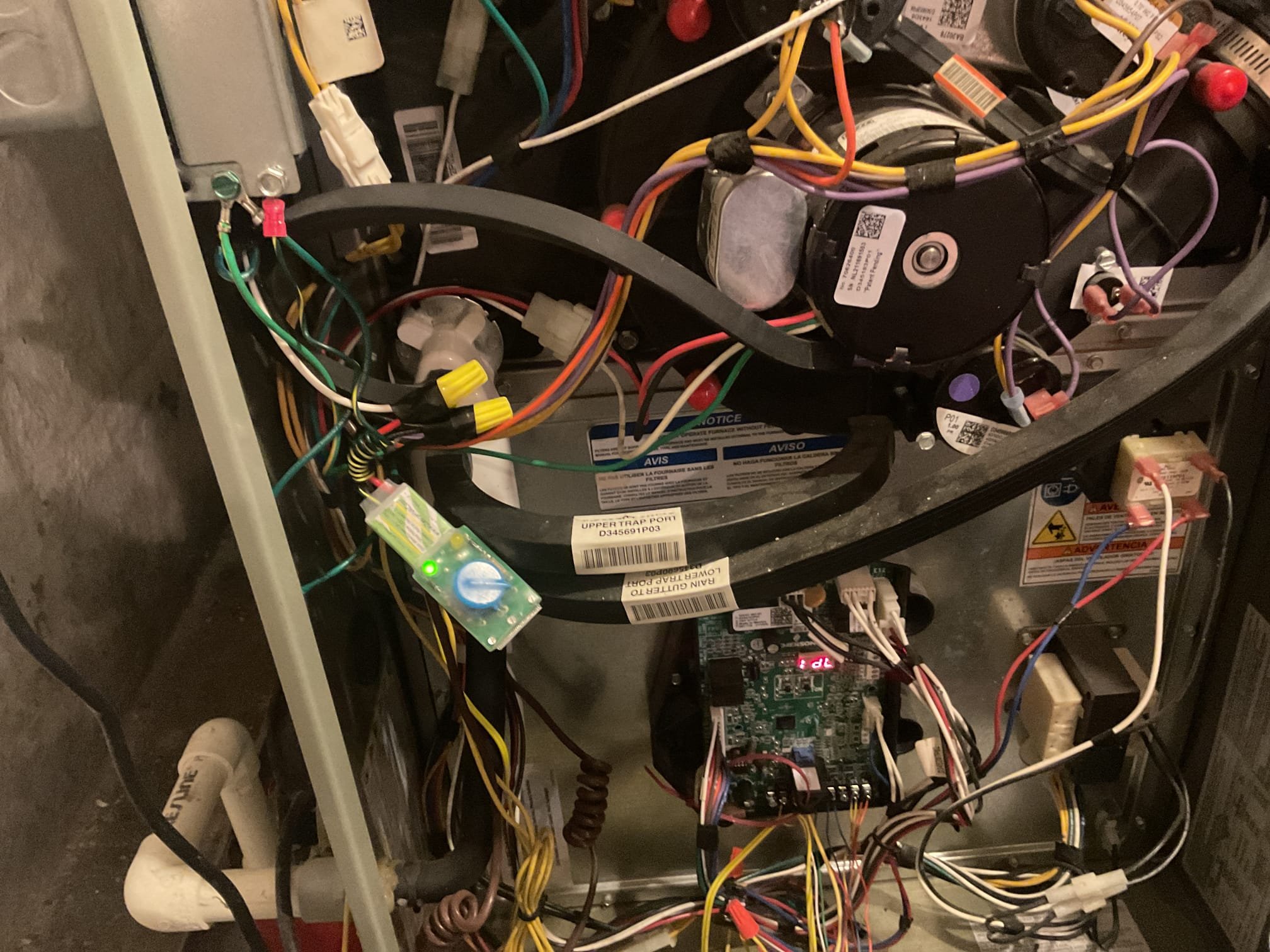 3/4/26. Performed precision heat tune up on 2017 trane propane high efficiency gas furnace. Replaced 16x25x1 air filter. Checked all electrical connections and components. Examined burners. Cleaned flame sensor. Checked gas pressure. Recommended installing a surge protector to help protect blower motor and control board, installed surge protector. Checked temperature rise and performed combustion test. Gas furnace is working properly at time of service 