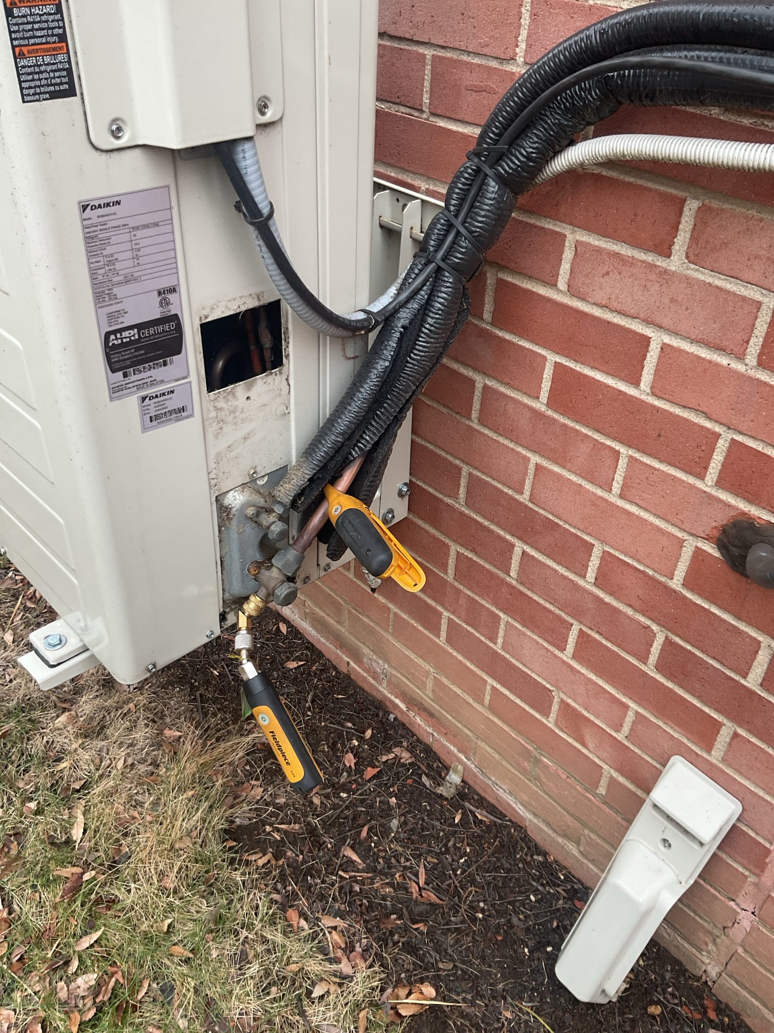 Completed (3) Heat tune ups for the classroom air handlers.

All (3) 16x24x2 filters ok
There was (1) loose A35 belt on Unit#3. Mike will replace soon. 
Inspected wiring, controls and electric motors.
Mdoor and outdoor coils in good condition.
Measured temperature rise and confirmed operation of hydronic zone valves.

The thermostats for units#2 and #3 were set to cool!
Noticed that the classroom for unit #2 was not cooling at all. Compressor locked out on low pressure. So I put refrigerant probes on this system. Has a history of needing to be charged R22 and there is no feasible way to replace this system. Provided estimate to add factory charge the system. 

Completed heat tune ups for (3) Minisplit systems.
(1)2 ton unit for machine classroom installed by Dibiase 2022
(2) 9000 BTU units for teachers rooms installed by another contractor. 15-16 Outdoor equipment on the roof.

For Each system:
Measured temperature rise or split.
Indoor and outdoor coils in good condition. 
Inspected w