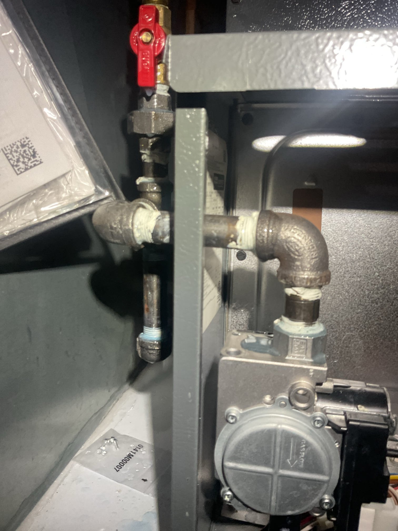 Checked over gas piping.
Gas piping is secure and anchored with appropriate clamps in multiple spots.
Gas pipe from the meter penetrates through the house above the concrete foundation at plywood sheathing as a 1” galvanized hard pipe with a collar mating around against siding. This pipe is in good condition. No flexible gas piping penetrates through any hard exterior walls. 

Flexible trap pipe is bonded to ground vial the water line where it comes into house.
Did a leak search on furnace piping.

Gas piping passes inspection. 