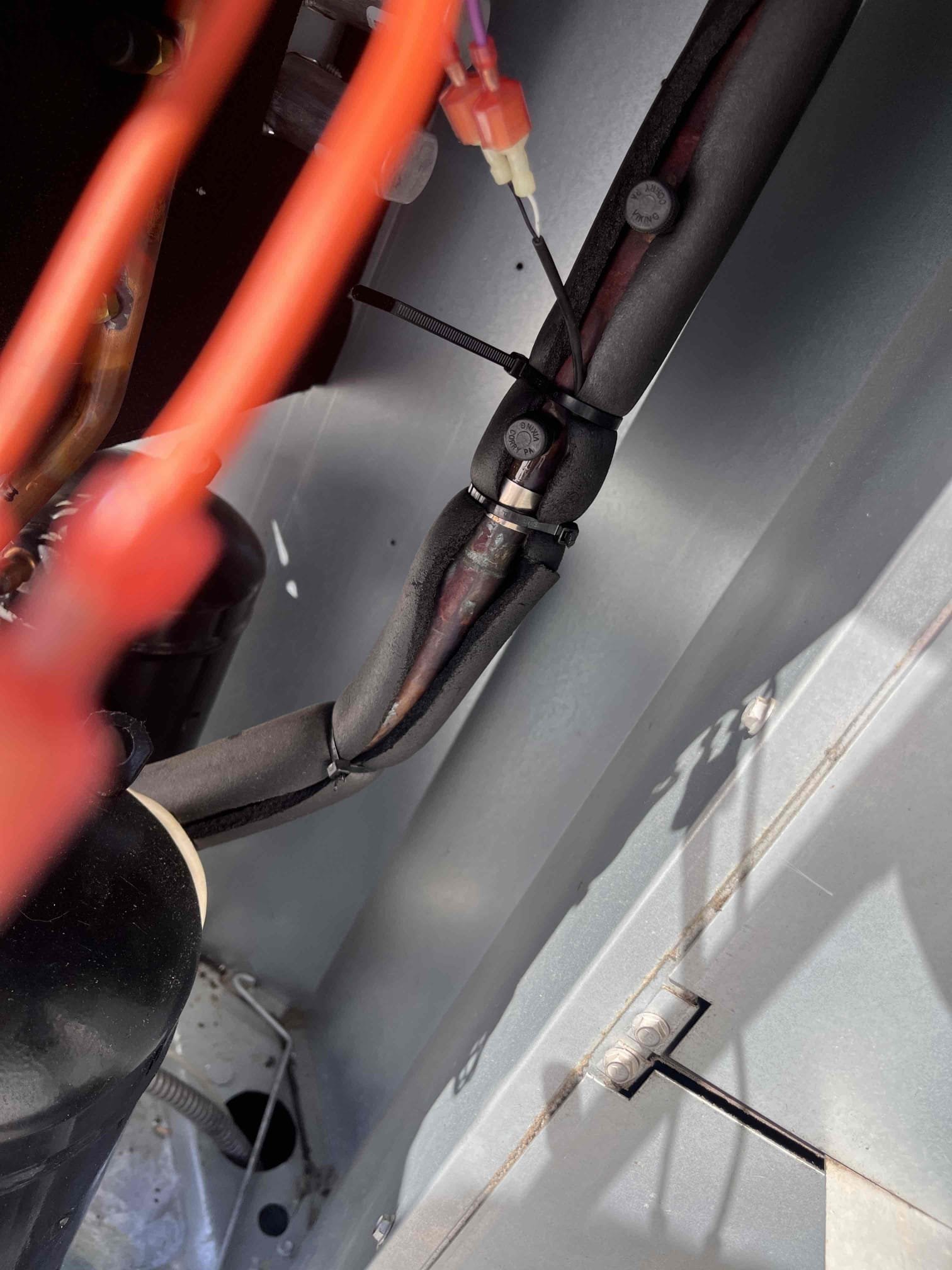 3/10/26 Kurt & Liz

Upon arrival went to rooftop, found only one compressor running on York heatpump serial #N2A1557064. Board was throwing code “1 coil freeze locked out”. Disconnected coil temperature sensor and restarted system, system ran with compressor #1, when second compressor went to start system would shut down and throw same code. Disconnected both temperature sensors and checked resistance, one temperature sensor was at 9.56kiloohms, other sensor was at 12.72 kiloohms. Restarted system with both temperature sensors disconnected, system ran, we found only first compressor still running. Board now throwing code “bad coil temperature sensor” With both sensors disconnected jumped out second compressor on control board and got second compressor to run with first compressor. With second compressor jumped out on control board and temperature sensors disconnected, system ran for extended period of time, until the jumper for the second compressor was removed. After jumper was remove