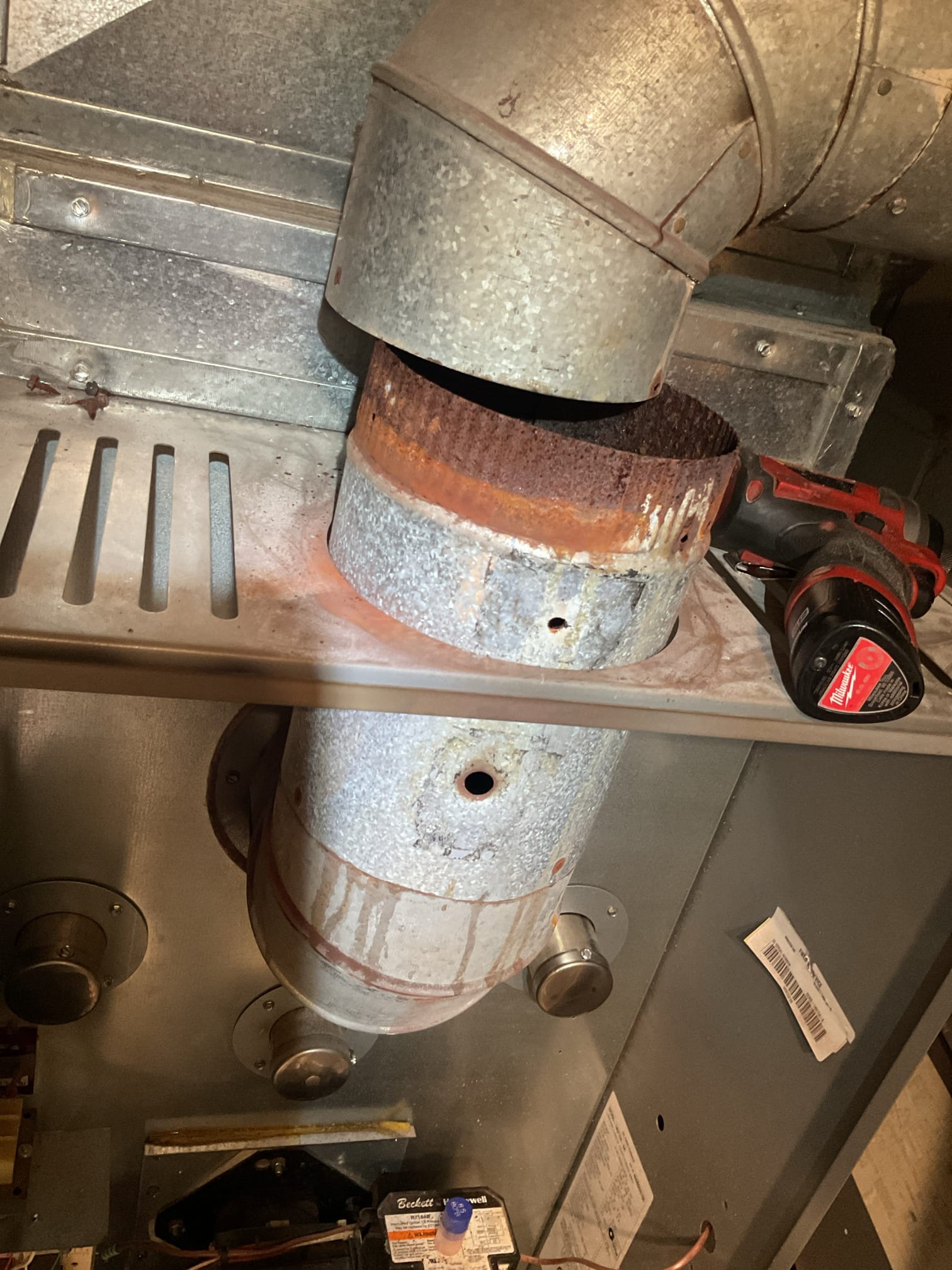 Luis 3-11-26 performed oil heater tune up 2008 Lennox heater, three trane heat pump from 2019 and Mitsubishi ductless. (2) 413 filter, (1) 212 and (1) 201. Humidifier for addition unit is off for season will need service in fall 2026. (It could be added to thermostat it has extra wires) 

Performed oil heater tune up on Lennox oil heater with af11 burner, test system operation before tune up. I noticed some noise coming from burner. Fuel pump has some oil drops under pump seals.  System came on and run for few minutes, I proceeded with tune up. Check all electrical connections and components, clean heat exchanger and flue pipe. Flue pipe is about 18 feet long to chimney base. Most of the piping is heavily corroded. And some of the fittings are starting to disintegrate. Replace oil filter and nozzle. After cleaning cycle furnace performed combustion and smoke test ok. Replace 213 filter. Inspect oil tank and fuel gage, I noticed corrosion on nitro, of the tank. And gage not working prop