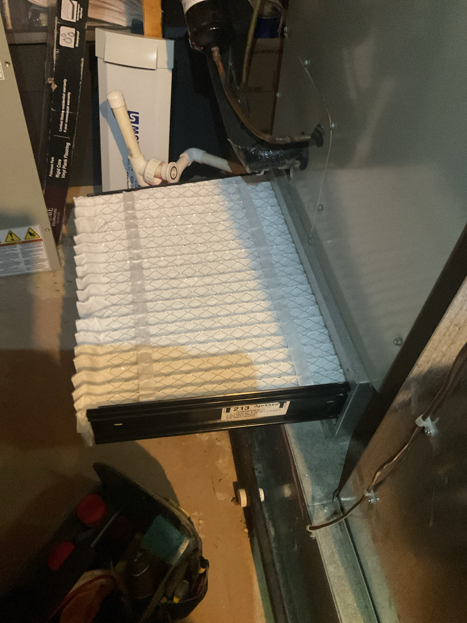 I Arrived to the customers home for a heat pump check up on a 5 yr old American standard heat pump system . I checked all electrical connections and voltages . I checked the air filter and replaced, filter size is an 213. Inspected the indoor coil and tested electric heat package. Took temp splits for the electric heat and blower motor amperage draws. I looked at the outdoor heat pump and tested for an outdoor btu output. Inspected the outdoor components and unit pressures. Everything is working fine at this time of service.  On arrival the wet switch was tripped , I found the trap wasn’t in the pump, so when the customers ran the a/c the past few days it leaked into the secondary pan and set off the safety. Collected for new contract and air filter and removing a small amount of water . 
