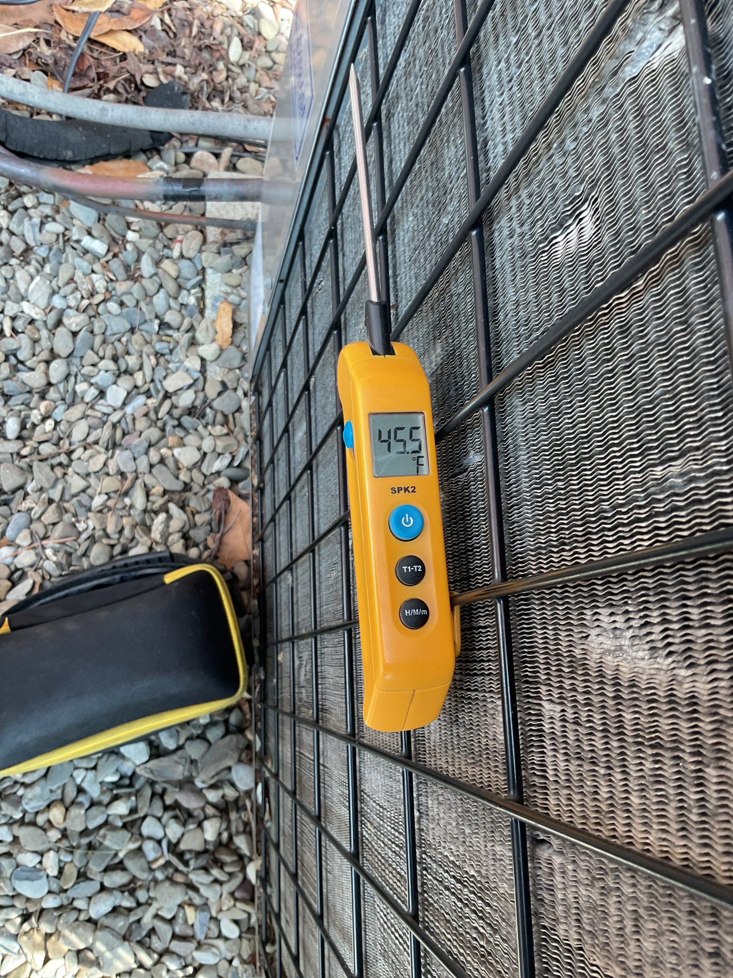 Equipment that was misbehaving was the 4 ton York R22 unit that serves main classroom.
Equipment is 24 years old approximately. 

They had turned AC on on the recent high temperature days and noticed outdoor unit sounding off.

Ultimately found failed 60/5 uF capacitor causing outdoor fan not to run.
Replaced capacitor and redid wiring connections as necessary.
Tested system R22 pressures are slightly low. Hard to assess because of very low ambient temperatures 45°
Called Mike who approved repairs.

My professional recommendation is to replace this system. 
*Would require a site visit to decide the best way to imstall indoor equipment 

