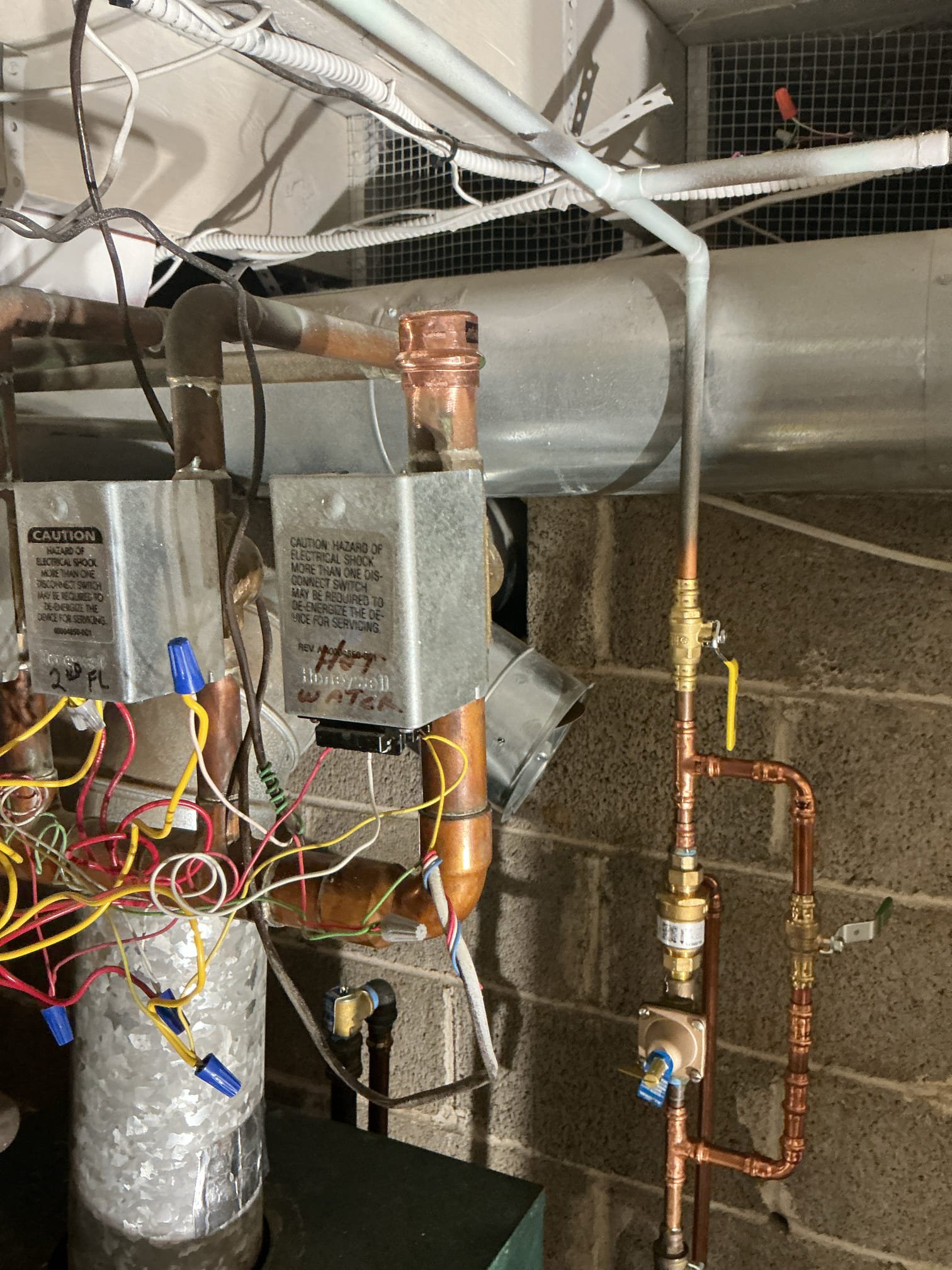 Installation of electric smart water heater, run new 10/2 from electrical panel to water heater location, install new 30 amp breaker and make space with mini style breakers 20 amps. Capped indirect water heater 1 in piping. Drain and purge boiler. 