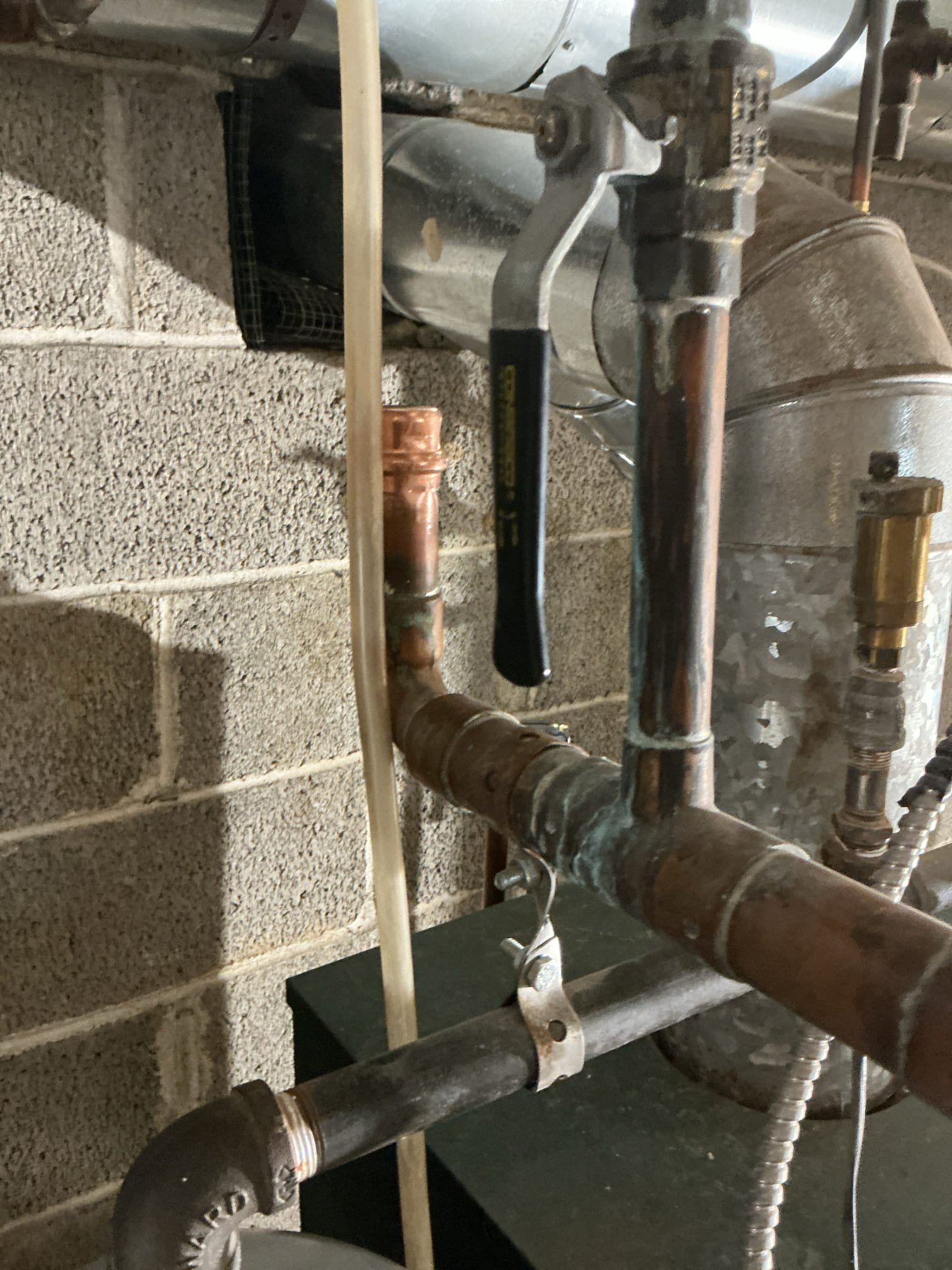 Installation of electric smart water heater, run new 10/2 from electrical panel to water heater location, install new 30 amp breaker and make space with mini style breakers 20 amps. Capped indirect water heater 1 in piping. Drain and purge boiler. 