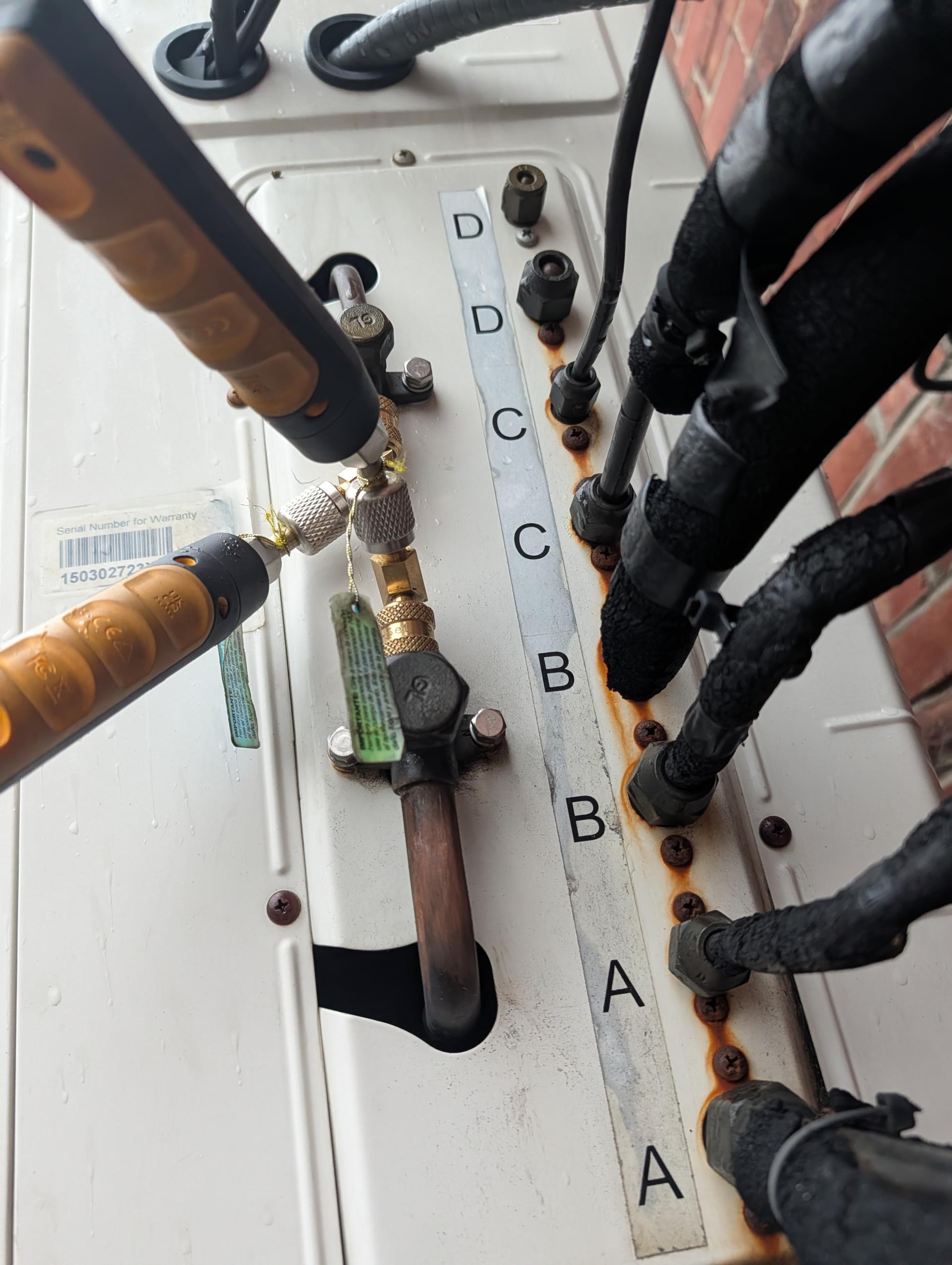 All (3) remotes for the Minisplits are missing. I asked a student he says they have been missing for some time. 
I remember all (3) were on site and Nick and I were able to test all last time I was here August. Provided estimate for (3) Trane Minisplit remotes. You may want to ask the instructors if the pit the, somewhere 

Cleaned all washable filters.
Put refrigerant probes on ports to verify that there is a charge (168psi standing: Good.)
Provided estimate to clean (1) Minisplit head. The control room and the back classroom heads head are very dirty. 

Minisplit system is 16 years old which is considered beyond replacement age. Consultations for system replacement are free from Dibiase.

