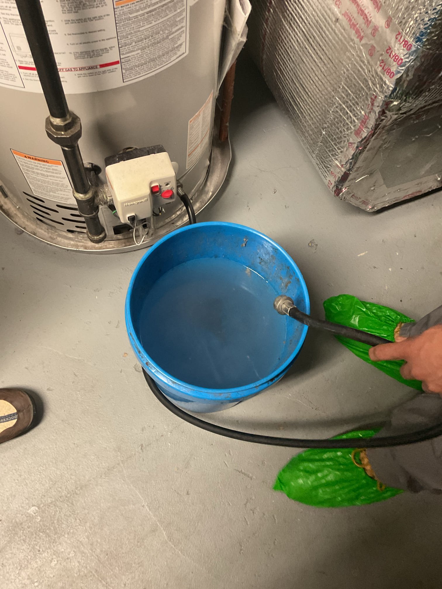 3/16/26. Performed water heater service on 2012 Bradford white power vented water heater. Drained 6 buckets of sediment water from tank. Inspected burner. Checked water pressure, found no expansion tank on existing water heater. Measured water temperature. Water heater is 14 years old , would recommend replacing at this time. Provided estimate. 