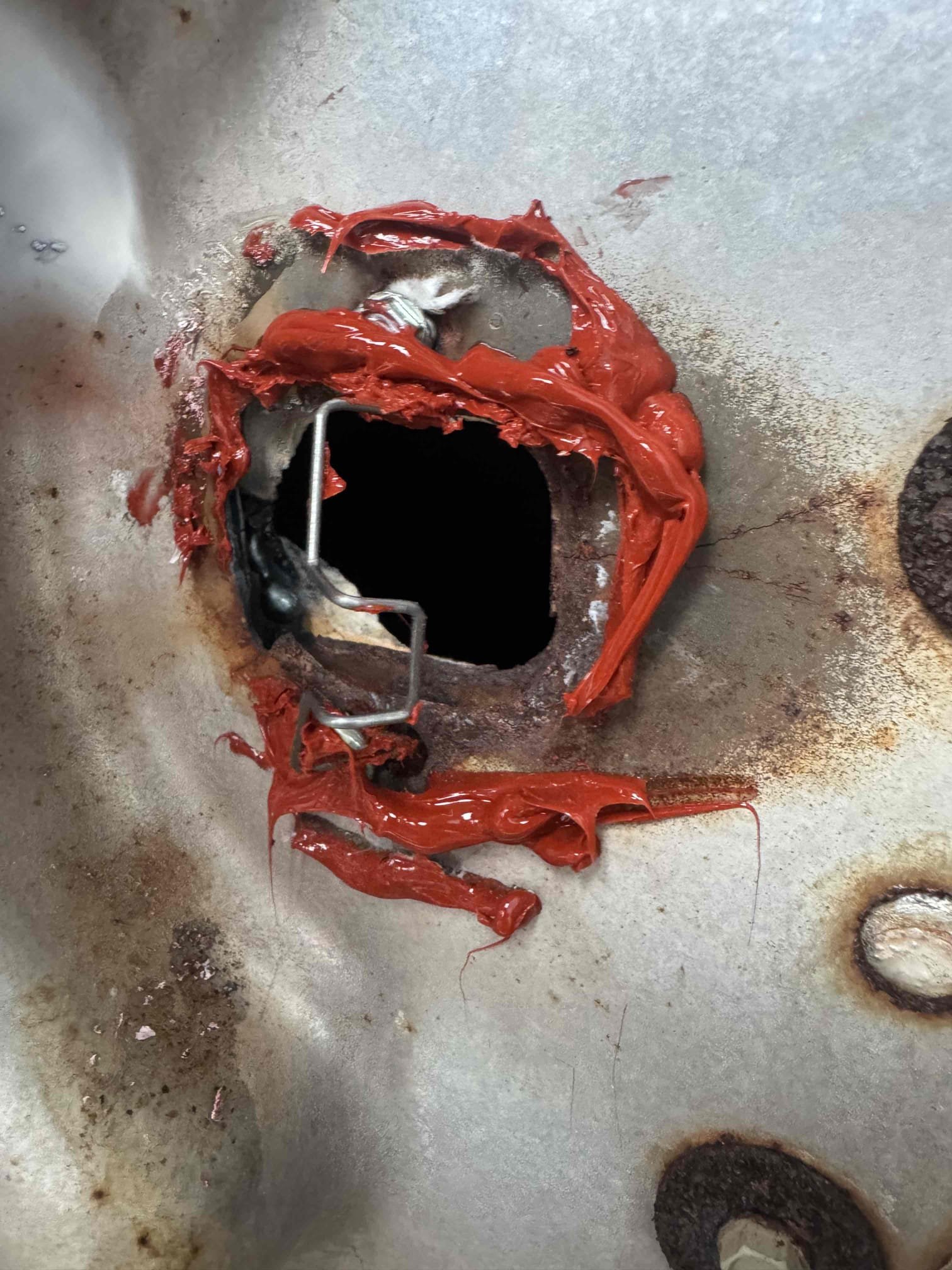 3/19/26.
 Removed old igniter and put new igniter in its place. Found that after installing the new igniter and cycling on gas furnace smoke started to come from bottom of roof top. Found that where the igniter goes in that the metal was disformed from heat at the heat exchanger so much that the new igniter could not make a good seal. Firberglass gasket started to burn and smoke was coming out at the supply. This is not repairable. Recommend replacement of roof top system. Talked to Charlene about situation. 
