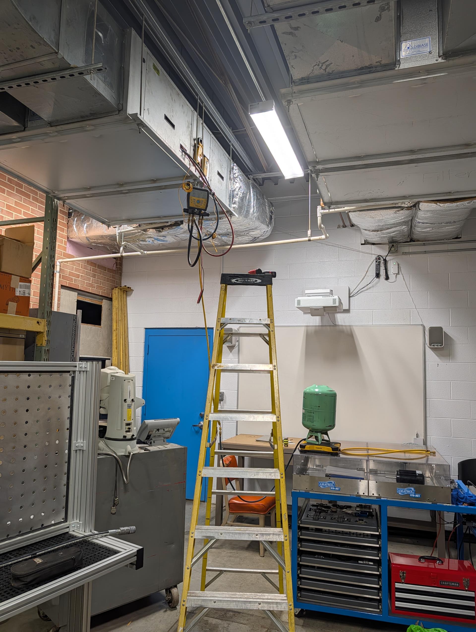 Charged unit #2 R22 as necessary. 5.oz
Tested system operations. 
Pressures 204/52 15SH 10° SC.
Temperature split 65-45=20°

Classroom for this system cooled 3.5° during tests.
System operating well at this time. 

They are interested in adding a Minisplit system to the room where this equipment is located. Was formerly a storage area but they are going to converted into. Small classroom. 


Unfortunately the wrong outdoor fan motor was shipped. I contacted Daikin and confirmed the updated part number and ordered the motor to be shipped to our shop.
We will schedule return visit to complete this part of the job, 
