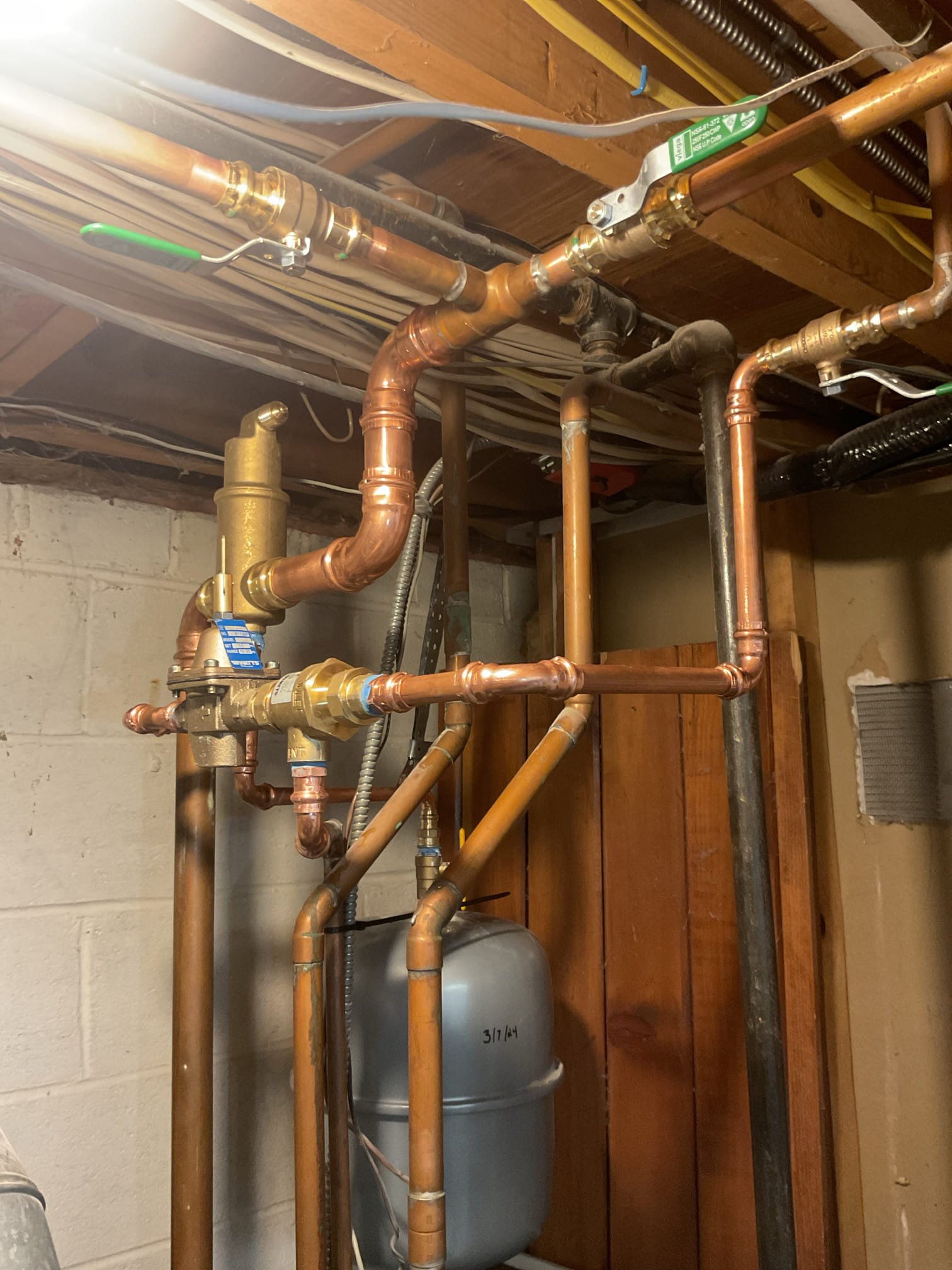 
3/30/26
Barry+Conner

Removed failed boiler feed valve and piping and capped off.
Cut back 1 1/4” supply to accommodate new Spirovent air eliminator.
Installed new Spirovent air eliminator, 1/2” boiler ball valve, backflow preventer with vent piping and pressure reducing feed valve.
Also installed (2) 3/4” isolation valves on the supply side which will allow for isolation of boiler components.

After fill and testing the boiler safety felief valve began trickling. I discussed with Mike and he agreed to replace. *I did not make this a part of my original estimate for the sake of keeping costs to a minimum but unfortunately it needs to be replaced. Mike agreed. Replaced boiler pressure relief valve. 

Installed expansion tank at water heater, pressurized to 60psi.

Afterwards tested system and hot water. Operating well at this time. 


