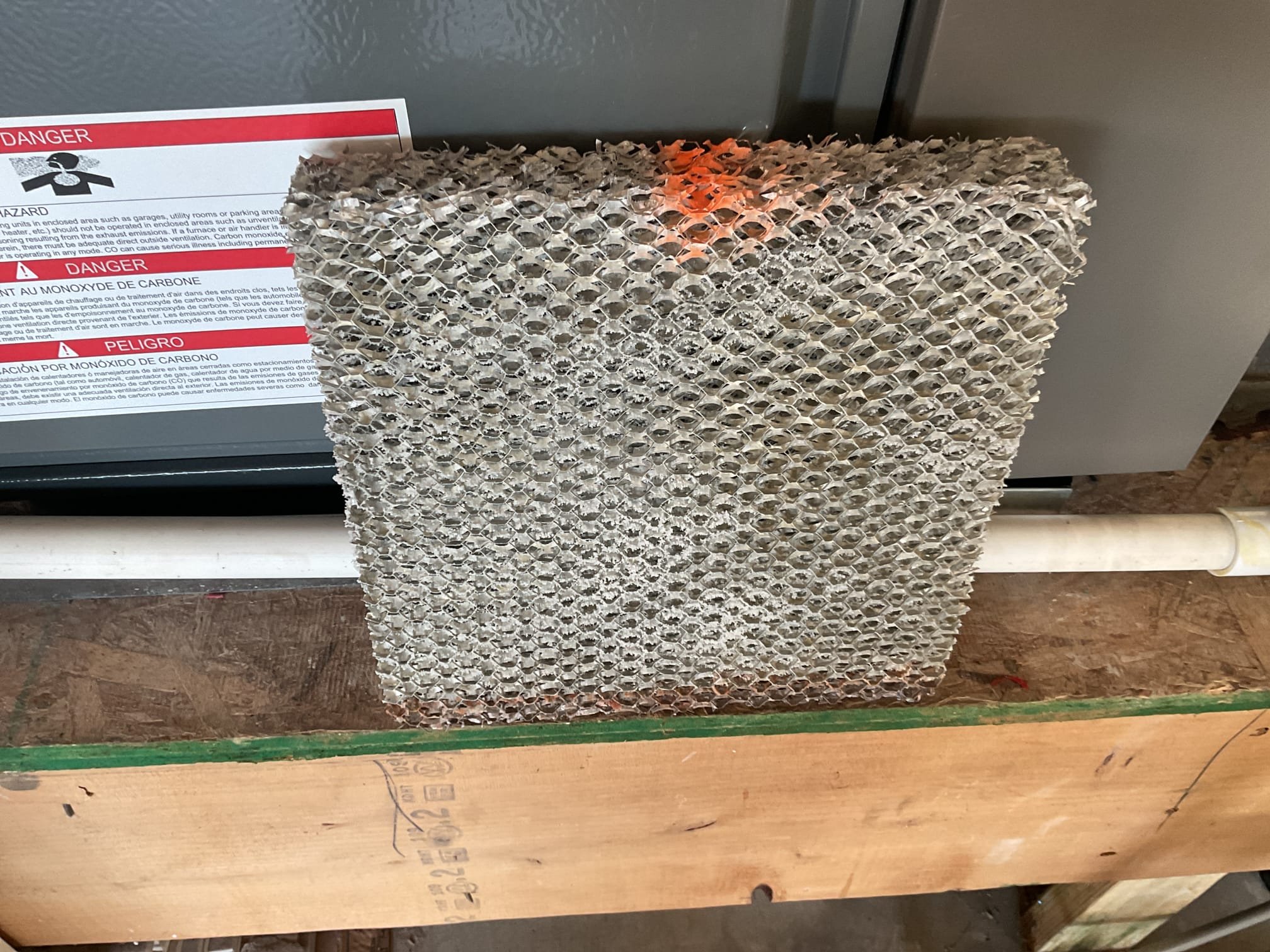 4/8/26. Fully assessed water leaking situation. Found that the water was not coming from the water heater it was coming from the Exsisting Honeywell humidifier. Opened up humidifier and found #10 pad all clogged up. Recommend that we service the humidifier. Replaced existing pad and Wipped out inside of humidifier housing. Blew out drain line. Turned back on humidifier and set to 35%. Humidifier is working properly at time of service. 