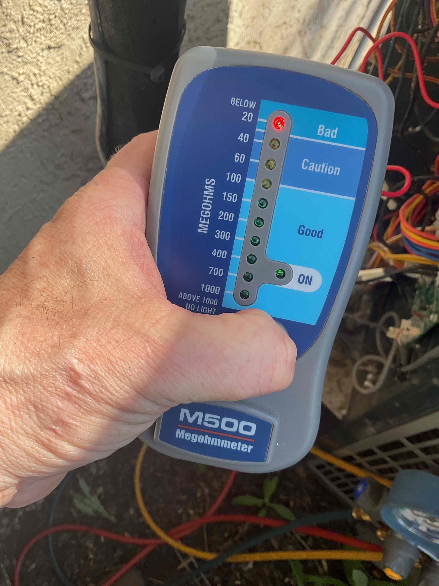 I arrived for a no cooling for a new customer. The heat pump American standard system is 10 yrs old . The customer had told me he had a guy out here for a few times to add charge to the system, but he never thought he actually repaired it. I went and looked over the indoor unit first I replaced the customers air filter supplied by the customer I inspected his coil and his blower housing and the motor. The blower motor housing had some growth on it . I went to the outdoor unit I put my gauges on. I had decent equalization of my pressures and went and turned the system on the indoor but not the outdoor. I had a call from the thermostat for cooling, but I didn’t have 240 V for power I found the breaker was tripped. I reset the breaker, and you could hear the compressor trying to run but tripped out again. I did a test on the capacitor and the compressor itself and the compressor internals has failed shorted to ground Causing it to trip the breaker. I Mega ohmed My leads at the contactor a