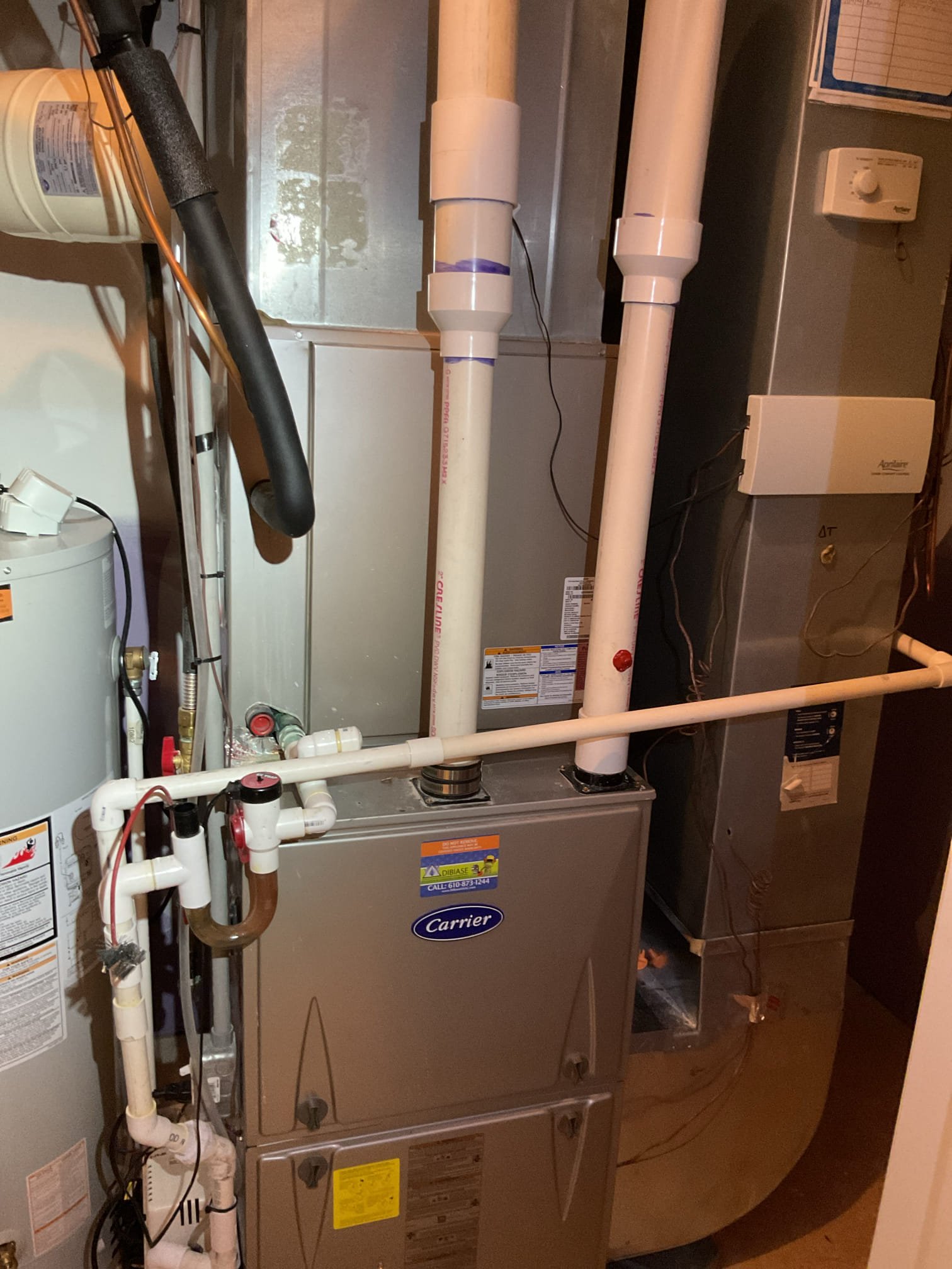 Completed AC Tune up for 3.5 ton carrier system. System dates to 2015. 10-11 years old. 

100,000 BTU furnace with 3.5 ton AC (2) Zones
*Dibiase replaced furnace heat exchanger November 2024. 
In the past we provided estimate to replace the zoning of the system because the first floor damper periodically gets stuck. Emailed updated estimate for replacing zoning.

Replaced 16x25x1 filter
Indoor and outdoor coils in good condition 
Inspected wiring, controls, electric motors and components; left estimates for surge protectors 
Measured temperature split and static pressure 
Inspected drains; clears EZ trap, tested pump; added treatment tabs to drain pan. System does not have wet switch/flood safety, Device that will shut equipment down if water makes its way into pan under indoor equipment. 
Checked integrity of compressor motor (mega ohm test)

Assessed refrigerant charge checked pressures. 8° Subcooling ok

AC system operating well at this time but Zoning has history of not working pro