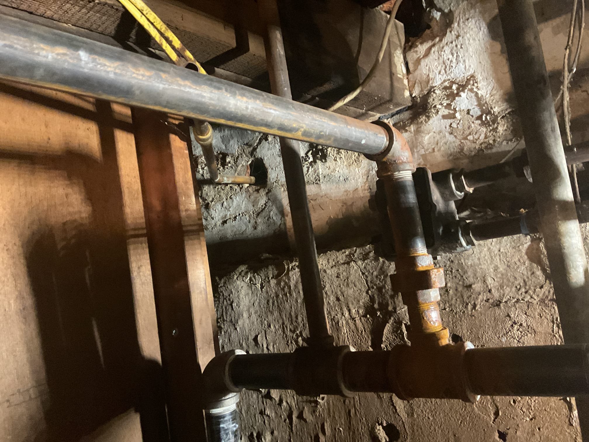 3/14/26. Looked over steam pipping . Found one active leak on pipping. Found that the 1” black iron pipe did not have dope or tape. She also mentioned that the other company was at the home almost once a weak adding water to the steam boiler, possibly a bad water feeder but can’t run the boiler at this time. Found a lot of old cast iron piping that could leak at any time. Also found boiler exhaust up against pvc sewer main. They don’t want to do any work at this point just wanted to get everything checked out took photos of findings. 