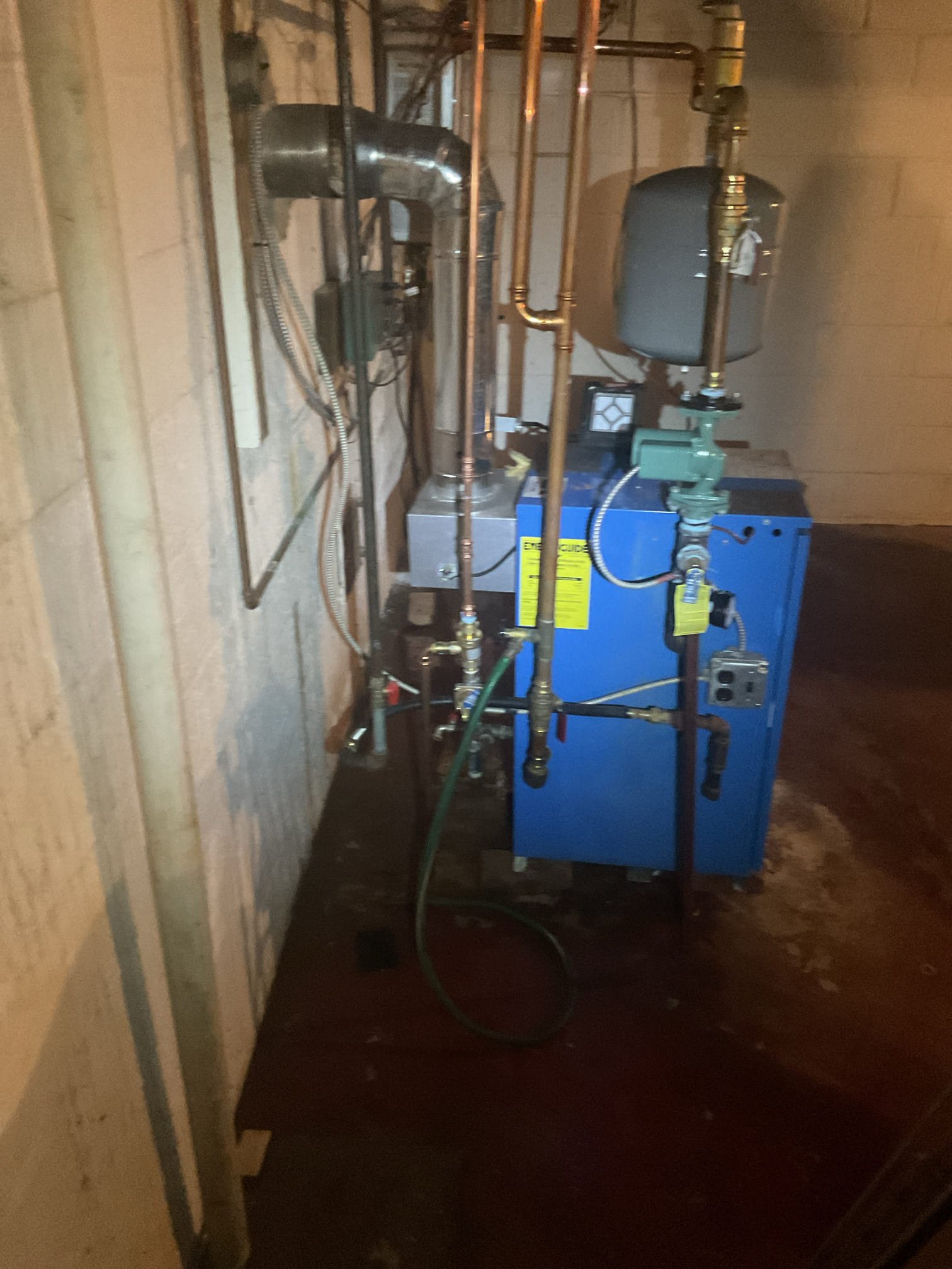 Luis and Conner 4-15-26 repipe supply piping on boiler with new 1 1/4 black iron pipe and fittings, installed new pressure relief valve, new circulation pump, water feeder and expansion tank, replacement of two mixing valves for radiant heat, and one zone valve for the radiant zone (middle zone new style valve), flush system, and purge air test boil operation ok. Adjust final billing since two zone valves were not replaced. 