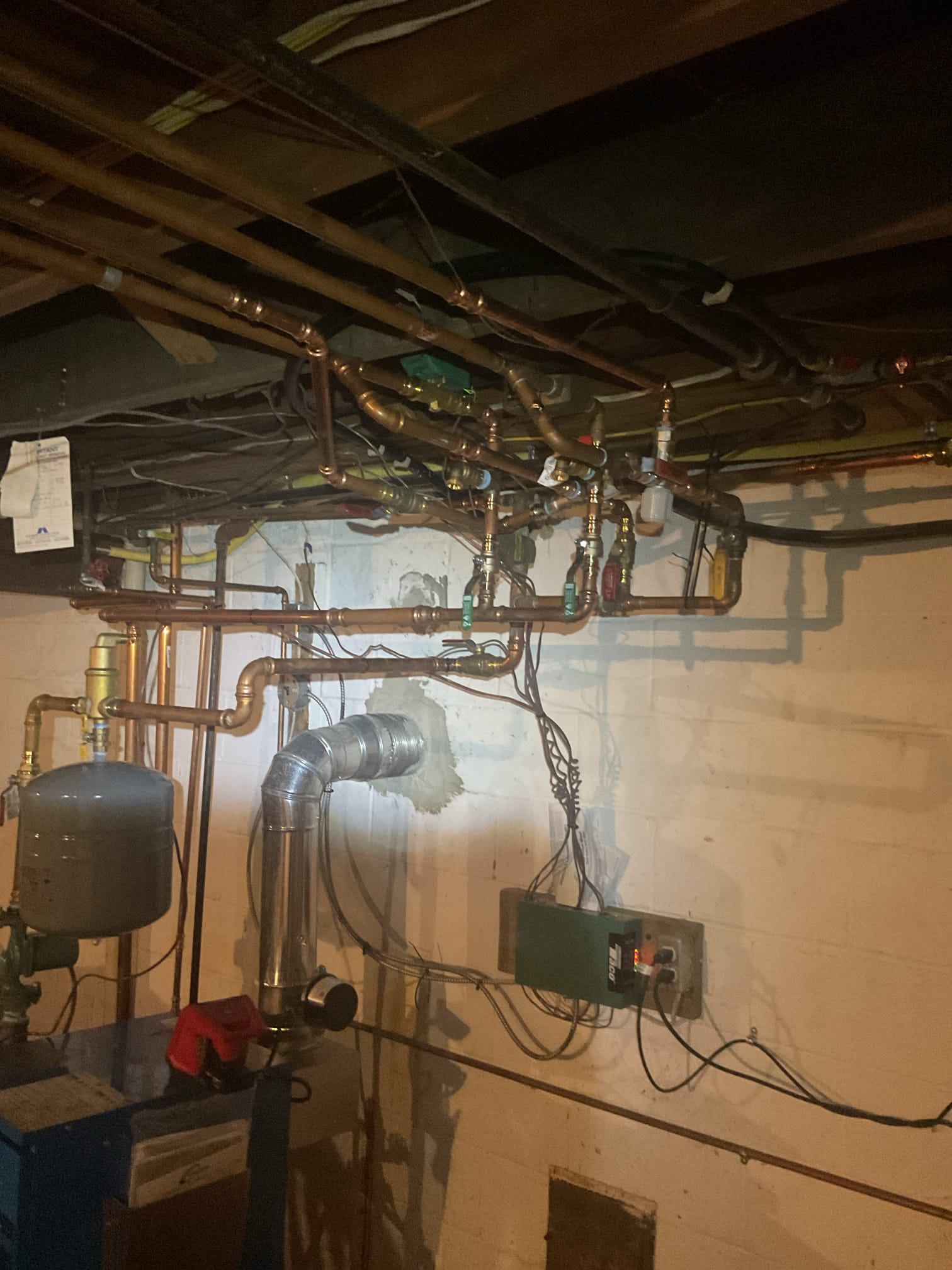 Luis and Conner 4-15-26 repipe supply piping on boiler with new 1 1/4 black iron pipe and fittings, installed new pressure relief valve, new circulation pump, water feeder and expansion tank, replacement of two mixing valves for radiant heat, and one zone valve for the radiant zone (middle zone new style valve), flush system, and purge air test boil operation ok. Adjust final billing since two zone valves were not replaced. 