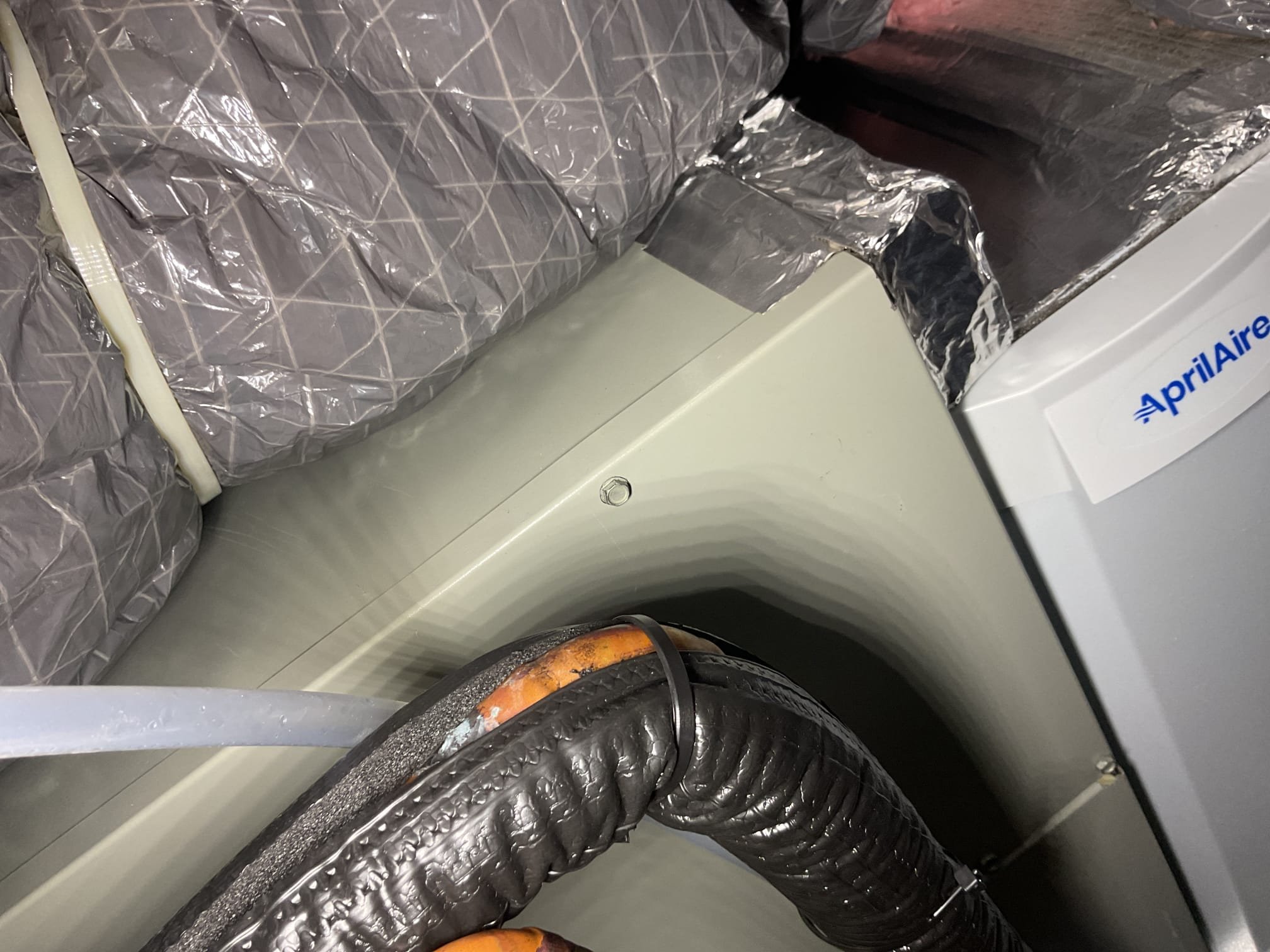 4/16/26. Performed precision a/c tune up on 454b trane 2025 heat pump system. Replaced aprilaire 313 air filter. Checked all electrical connections and components. Found that the air filter was pretty dusty provided estimate to install Apcox uv air purifier for better air quality. Also checked temperature split. Homeowner showed me a photo of the wet switch was tripped and a small puddle of water in the auxiliary drain pan. Found on the linset it could use a little more insulation and also small amount of air leaking where it goes into the air handler. Siliconed around suction line connection and insulated with foam tape.  Brushed out ez trap, did not put gauges onto system do to being critical charge. Heat pump system is working properly at time of service. 
High efficiency air filter 