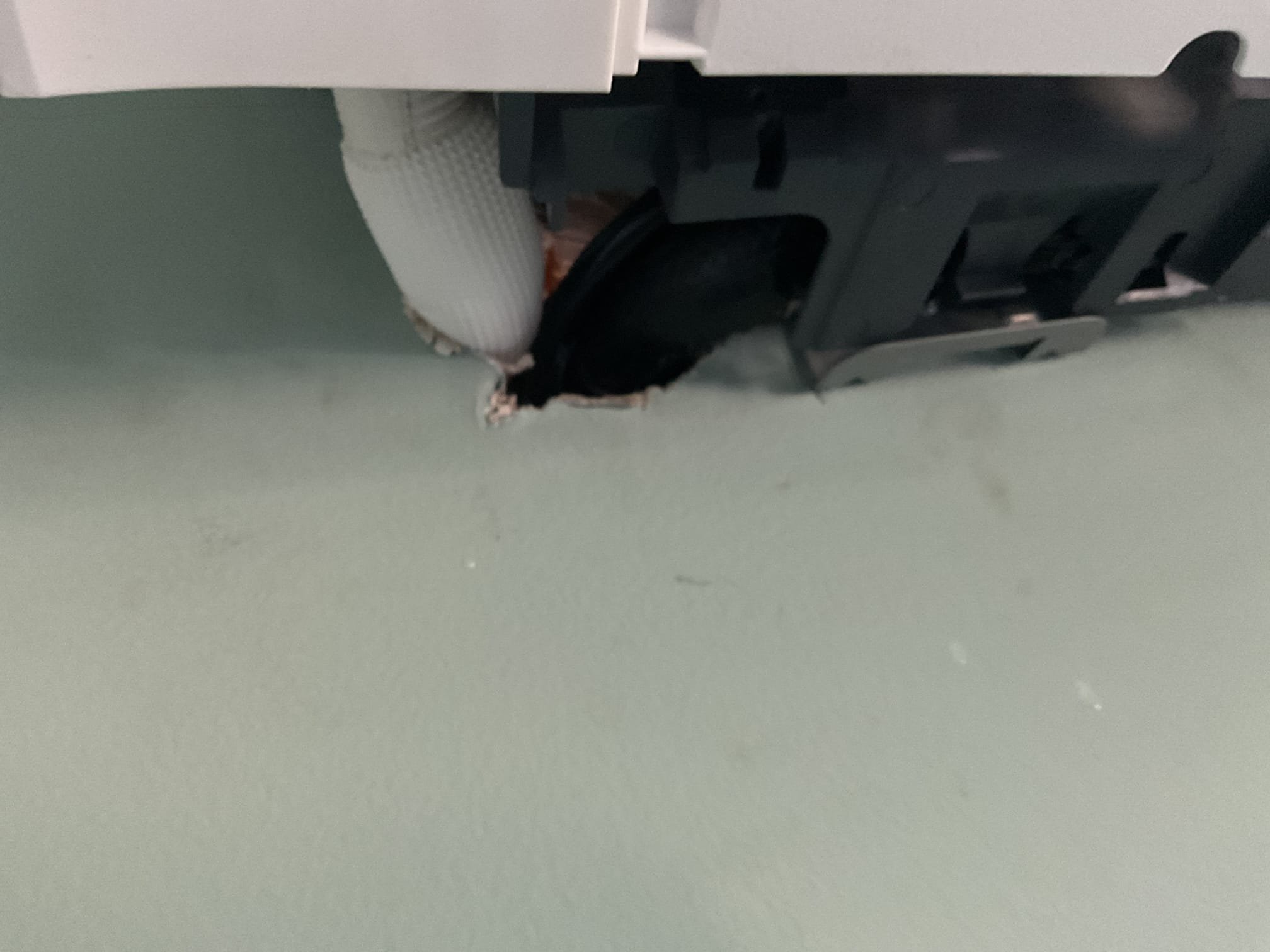 Fully assessed water leaking situation on recently installed Hisense mini split system installed by dibiase. Found water dripping from mini split head. Found condensation drain going up hill over top of linset as it exists the wall. Was able to break out some of the dry wall and pull on condensation hose from down below to get it tucked under linset. Used water bottle and poured water over the coil, no water dripped from mini split head. Put system into cooling mode and tested operation, did not see any more water dripping. Let customer know to keep an eye on it and and further issues we would need to guys and extension ladder to re route the drain even more. A/c is working properly at time of service. 