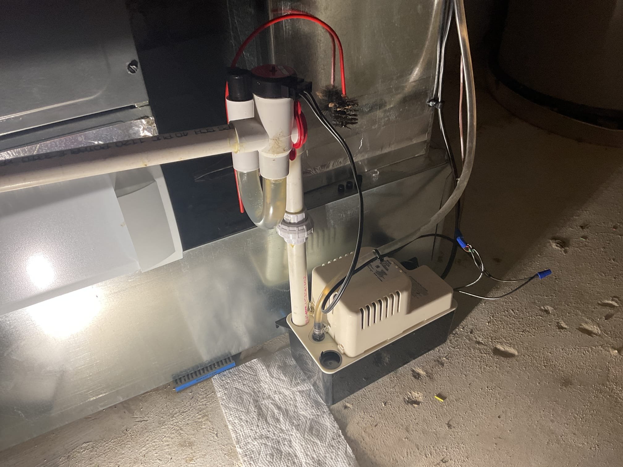 5/20/26. Fully assessed water leak from 2020 aman heat pump. Found everything completely dry when I arrived. Found no water around system at all. Poured water down ez trap and condensation pump pump and nothing leaked. Mark desribed it as a very small puddle. More than likely the water came from condensation from the ez trap sweating. Provided estimate to insulate eztrap. Homeowner is going to do it himself. A/c is working properly at time of service. 