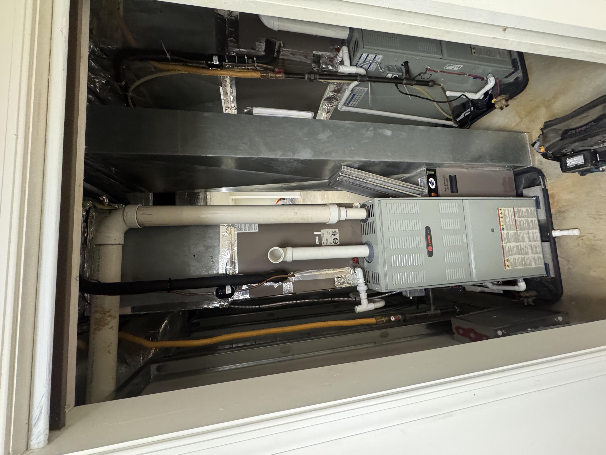 Basement 90% furnace/AC-(TRANE)
-Arrived on site and spoke with customer 
-Was told system is running but not blowing out cold air
-Verified operation on system and verified pressures
-System was severely low on refrigerant (hi-200 lo-190)
-A return visit is needed and system will be leak searched & charged properly to insure operation (additional charge if we need to add dye/sealant)
-System is currently inoperable and a return visit is needed 

5/22/26

Ultimately determined that compressor is not running at all for second floor system (but condenser fan is). 45/5 capacitor Good. Tried (2) different kinds of start kits but to no avail.

Outdoor units and furnaces were replaced in 2018 but the original indoor coils were kept! Indoor coils are 20 years old. The only warranty remaining is for furnace heat exchanger
 
Standing pressures 165. There is refrigerant in system. Did a complimentary electronic leak search on indoor coil and brazed joints. Sprayed brazed joints with leak detecti