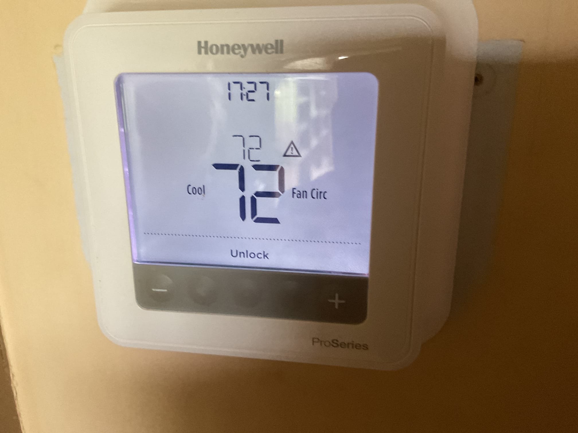 5/22/26. Recently installed system working properly, found Exsisting thermostat set up to enter a code to unlock. Un locked with Honeywell universal code 1234. Possibly from install could have also been an accident by the customer. Also found an alert on the screen for outside sensor. There is no outside sensor being used by the new system. Went into programming and removed outside sensor. Heat pump is working properly at time of service. 