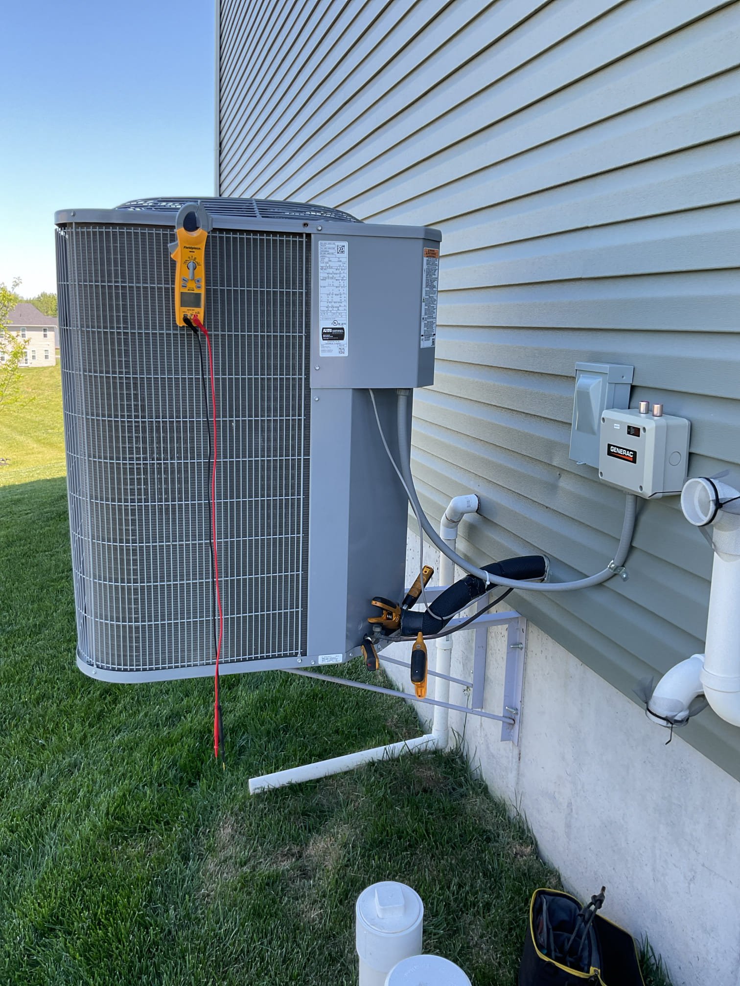 Completed AC tune up for 3 .5 Ton Carrier AC system
2 zones Honeywell zoning. 1st floor and master bedroom thermostats.
House was built in 2024

16x25x5 filter ok, recently replaced by homeowner 
Indoor and outdoor coils in good condition 
Inspected wiring, controls, electric motors and components; left estimates for surge protectors 
Measured temperature split (21°) and static pressure 
Inspected drains; cleared trap. Provided email estimate for EZ trap which is an AC drain trap with cleanout and overfill protection switch. 
Checked integrity of compressor motor (mega ohm test)

Assessed refrigerant charge checked pressures. 14° SC Good

*There is a DAS (discharge air sensor) in the supply plenum. Its purpose is to shut off the outdoor unit (compressor) when the temperature drops below 40° and then cut the compressor back in when temperature rises to 45° during cooling operation, This is to avoid freezing indoor coil especially when only 1 zone is calling and to make system more effic