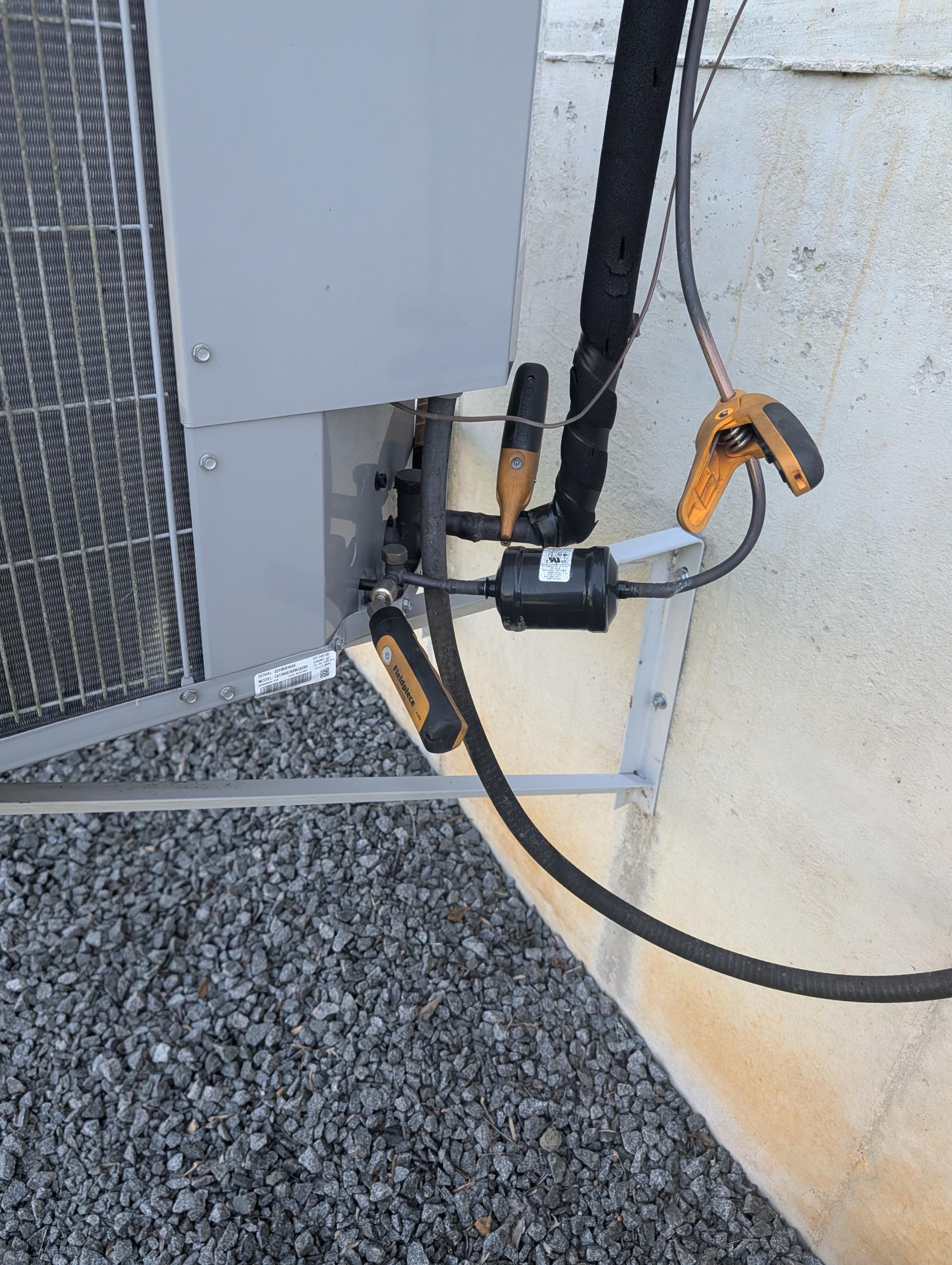 Completed (2) AC Tune ups under plan renewals.

Both systems are 3 Ton AC with propane furnaces.
1st Fl+Basement (2 zone system) and 2nd Fl.

Both Aprilaire 416 filters ok. Homeowner replaces every 6 months.

For each system:

-Indoor and outdoor coils in good condition 
-Inspected wiring, controls, electric motors and components; left estimates for surge protectors; outdoor capacitor 1st floor system slightly weak. Provided email estimate to replace this capacitor. 
-Measured temperature split and static pressure 
-Inspected drains; cleared EZ trap, tested pump; the discharge time for the first floor system pump is slightly longer than ideal. Vinyl tubing is in rough shape. Provided estimate to replace vinyl tubing for each system. 
-Checked integrity of compressor motor (mega ohm test)

Assessed refrigerant charge checked pressures. 
1st floor unit running at 1.2° Subcooling and 22° superheat. Unit is under charged.
2nd Floor system is a little better 5.7° subcooling 14° superheat bu