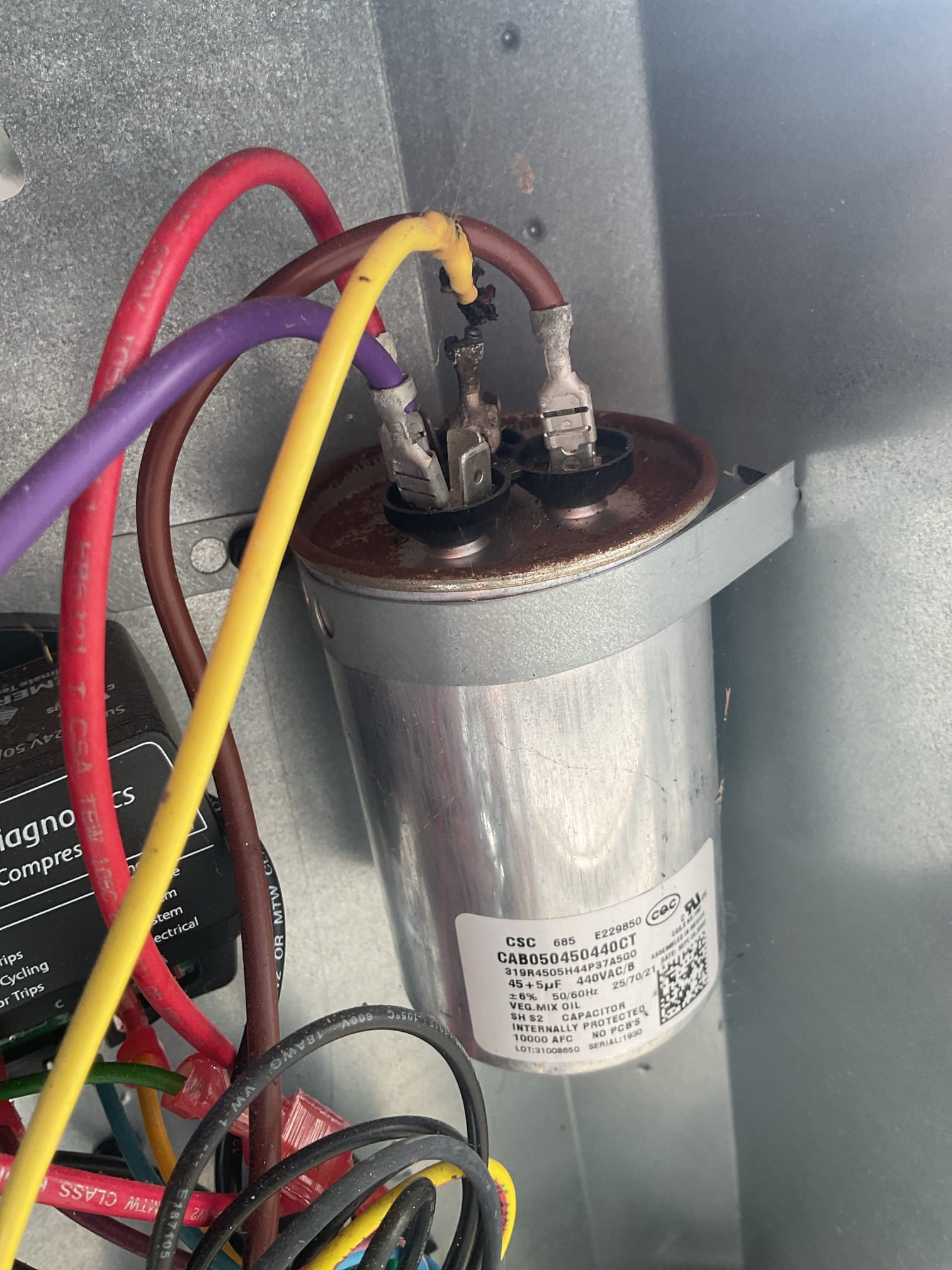 6/5/26. Fully assessed no cooling situation. Found indoor blower running but nothing running outside. A/c is a 2023 amana a/c installed by dibiase. Found failed 45/5 capacitor. Also found burnt ends on the wire terminals. Replaced terminal ends and 45/5 capacitor. Tested operation. Checked 410a refrigerant pressures. A/c is working properly at time of service. 
