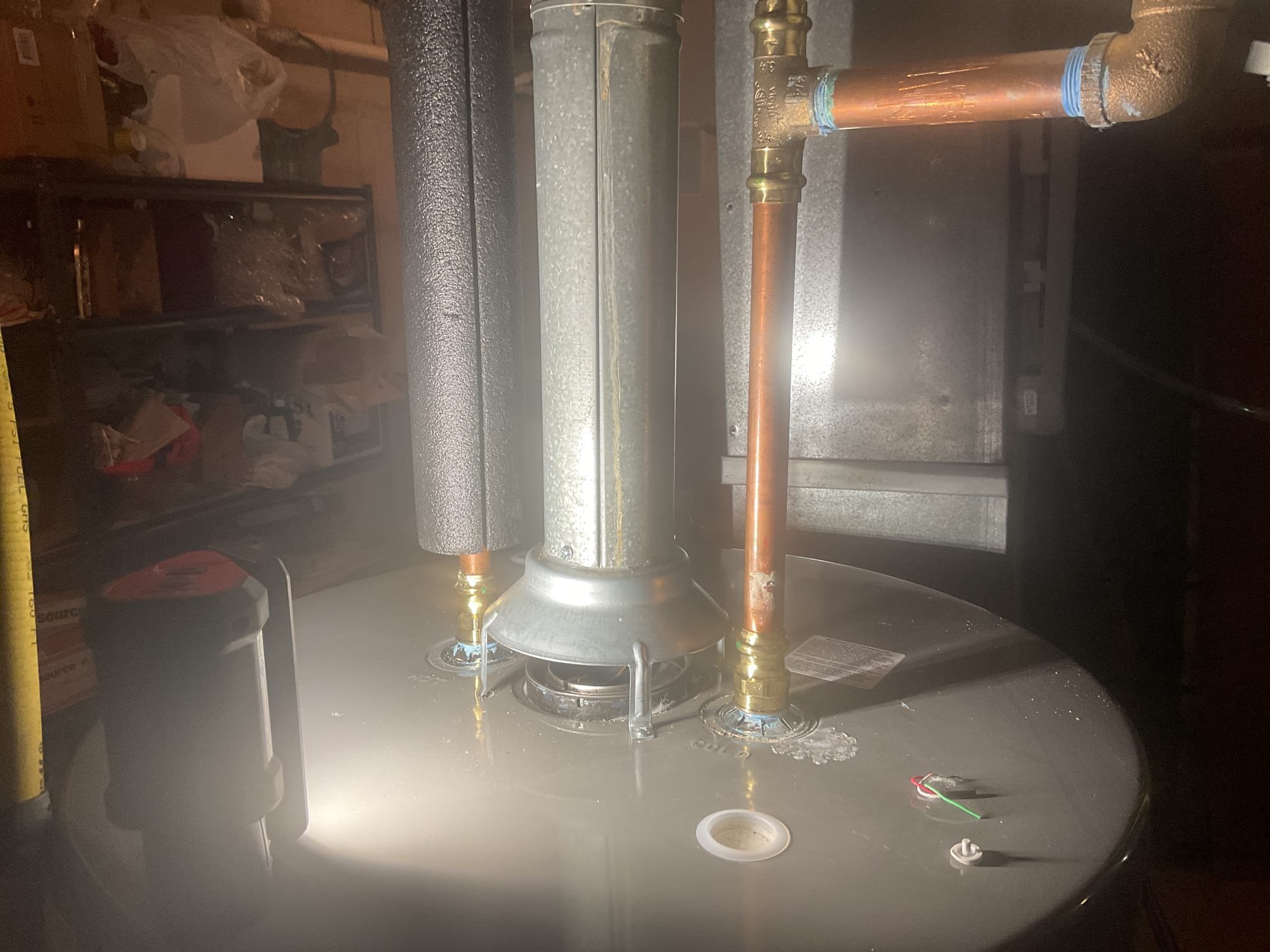 6/6/26. Fully assessed water in pan at water heater that was installed by dibiase 11/25. Shined bright light on water heater and inspected for leak. Checked all the connections on top all were dry. Felt around bottom of water heater and found it do be wet. Dried everything up and took off metal plate for burner compartment. Found foam was wet along the bottom and found water inside at bottom of water heater. Water heater has a very small leak from tank. Water heater needs replaced. Our office to order new water heater. Put leak detection back in and showed homeowner how to turn off water in case of emergency. 