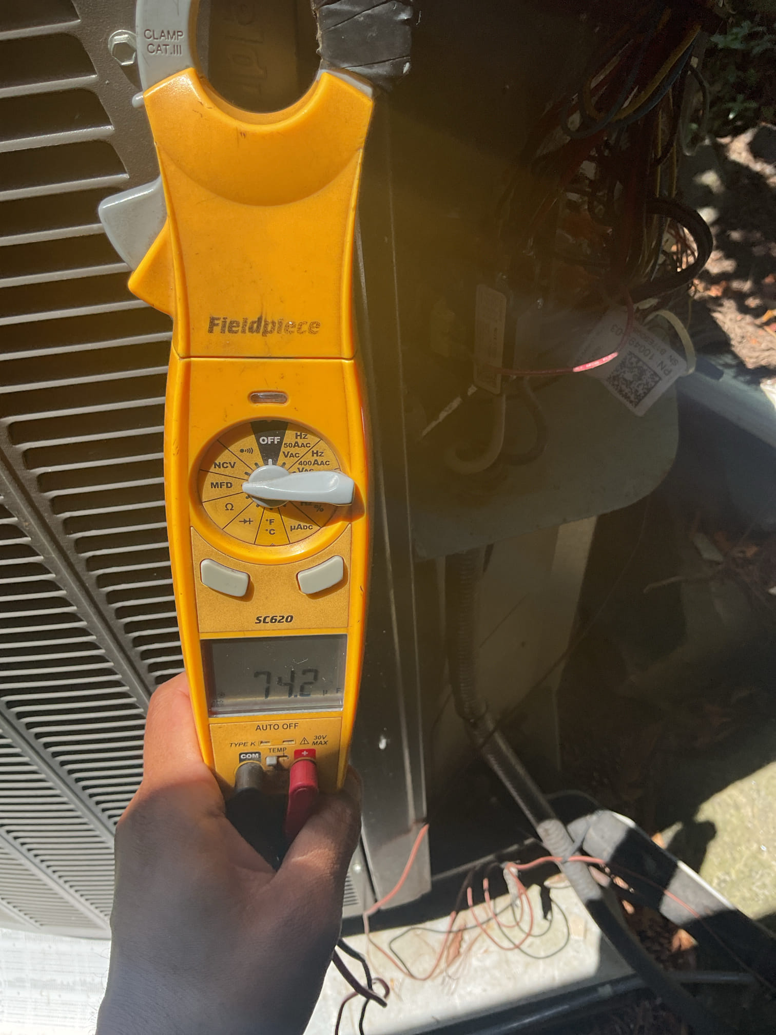 Luis 6-9-26
Performed ac tune up on Lennox 5 ton heat pump indoor coil and outdoor heat pump oil furnace as back up. Unit is from 2015 (11 year old). Turned thermostat to cool and test operation, check drain system flush drain and test pump ok. Check air delivery system blower motor and  capacitor, box filter. Capacitor reading below standards, box filter will need replacement soon. Check indoor coil and check Tempe differential supply and return. Check outdoor unit electrical components low and high compressor makes noise. Found disconnect plunger not seated properly(damaged plunger) dual capacitor reading ok on compressor side but below standards on the fan side. See photos. Check refrigerant levels and pressures ok. Unit does make big noise when it comes on and pulls higher amps. I provided estimate for minimum repairs and recommendations.  
System currently operational but nearing end of normal life expectancy. Due to age, replacement of system should be considered in near future. 