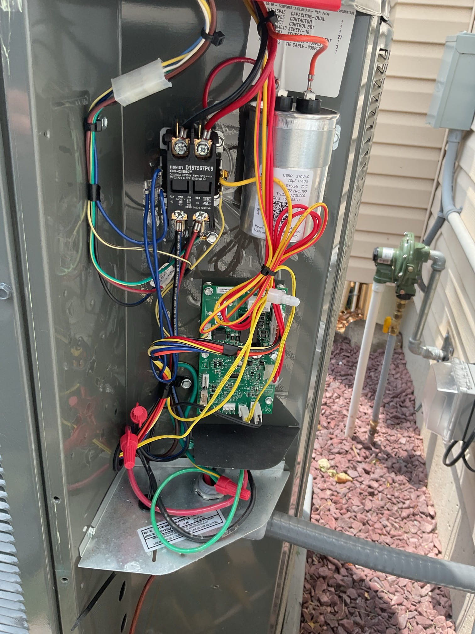 AC tune up for 5 Ton AC
Equipment is hybrid propane furnace/heat pump installed last month 5/23/26. 

20x25x4 filter ok recommend replacing every 3-4 months.
Completed AC tune up for 3 Ton Amana AC system
Indoor and outdoor coils in good condition 
Inspected wiring, controls, electric motors and components; left estimates for surge protectors.  Currently has Nest thermostat.
 Provided estimate for Honeywell S1200 thermostat with EIM which will allow for more precise control of furnace staging and furnace lockouts in heating and allow for sensors and accessory wiring, *Cooling fan motor speed set to 450 CFM/ton. Black wire at defrost board is for bringing on auxiliary heat during defrost. Wired it in today,* they had already wired the white conductor between the outdoor unit and indoor control to the W1 terminal. Wired black conductor (X2) from defrost to white W1. 
Measured temperature split and static pressure 
Inspected drains; cleared trap tested pump; wet switch, ez trap and conden