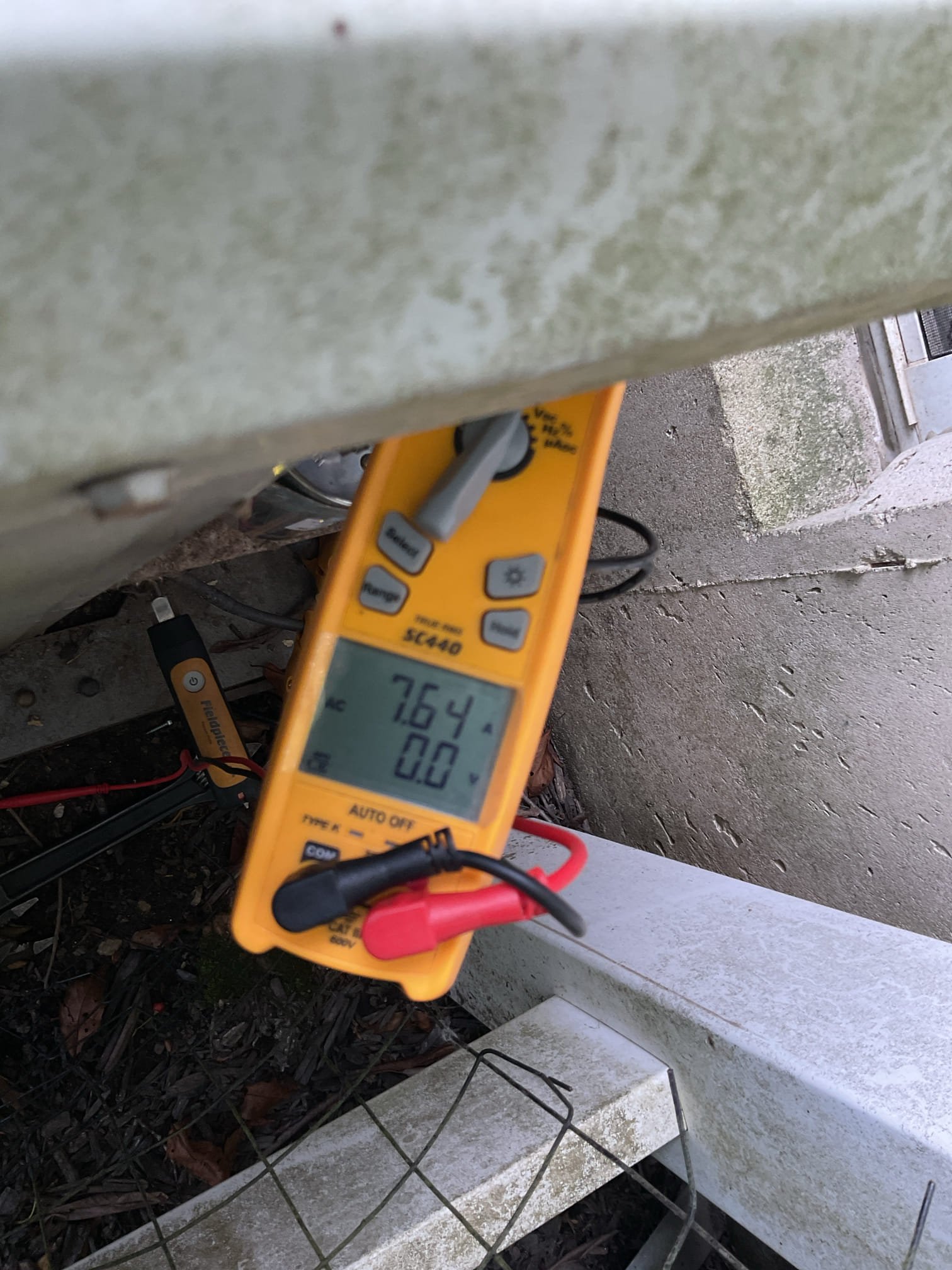 Equipment is 4 Ton AC with gas funace.
Dates to 2000 26 years old.

Outdoor fan not running. Determined that this was caused by the wire for the run winding of the condenser fan was detached from, capacitor. The capacitor was reading within specs so I offered to either repair the wiring, or giving that the one terminal on the capacitor was burnt to replace the capacitor altogether.
I replaced the capacitor (55/5 uF) and redid wiring with new connectors. 
*Contactor is newer and there is a Superboost hard start kit.

Afterwards tested system. Found r22 pressures to be low. System is undercharged on r22 which is an outdated refrigerant. 
245/58 40SH 4 SC outdoor temperature 72°
System will not cool well of at all and the indoor AC coil could freeze. 
She is going to keep an eye on it for now. She will call us for consultation after looking at her schedule
 
The only feasible solution is to upgrade/replace HVAC system. System is well beyond replacement age.

Homeowner decided on diagnosti