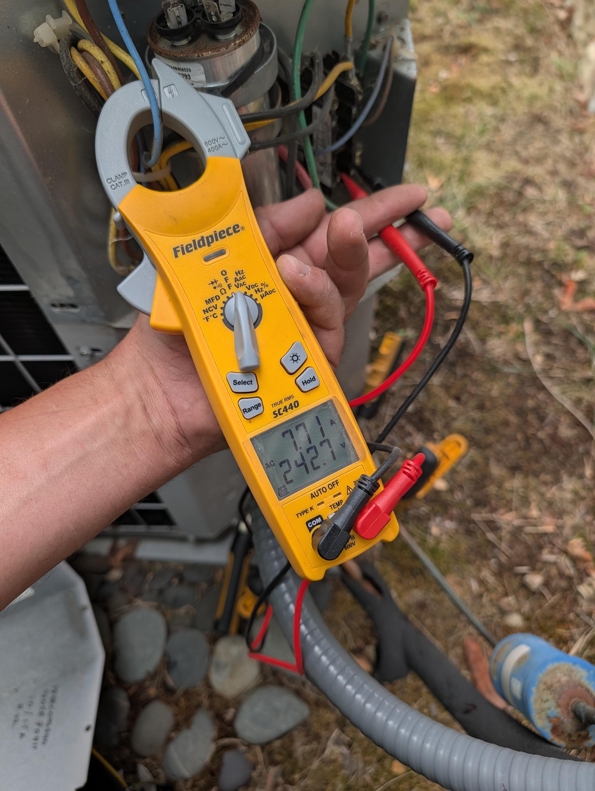 Completed AC tune up.
Equipment is 3.5 Ton AC with 110,000 BTU gas furnace (80% efficiency). Was installed in 2005. 21 years old.

16x25x1 filter is clean 
Indoor coil is rusty as to be expected given age. Bottom fins on outdoor coil are smushed or missing but otherwise coil is clean. Outdoor unit is not level. Provided email estimate to level outdoor unit 
Inspected wiring, controls, electric motors and components; there is no surge protection; left estimates for surge protectors 
Measured temperature split and static pressure 
Inspected drains; there is no overfill protection switch. There is no wet switch. Equipment is installed in loft on second floor. A wet switch is highly recommended. Will shut equipment down if water makes its way on to floors around equipment. 
 
Checked integrity of compressor motor (mega ohm test)

Assessed refrigerant charge checked pressures. Good 

AC system operating well at this time. Lacks surge protection and water safeties, Equipment is 21 years old.