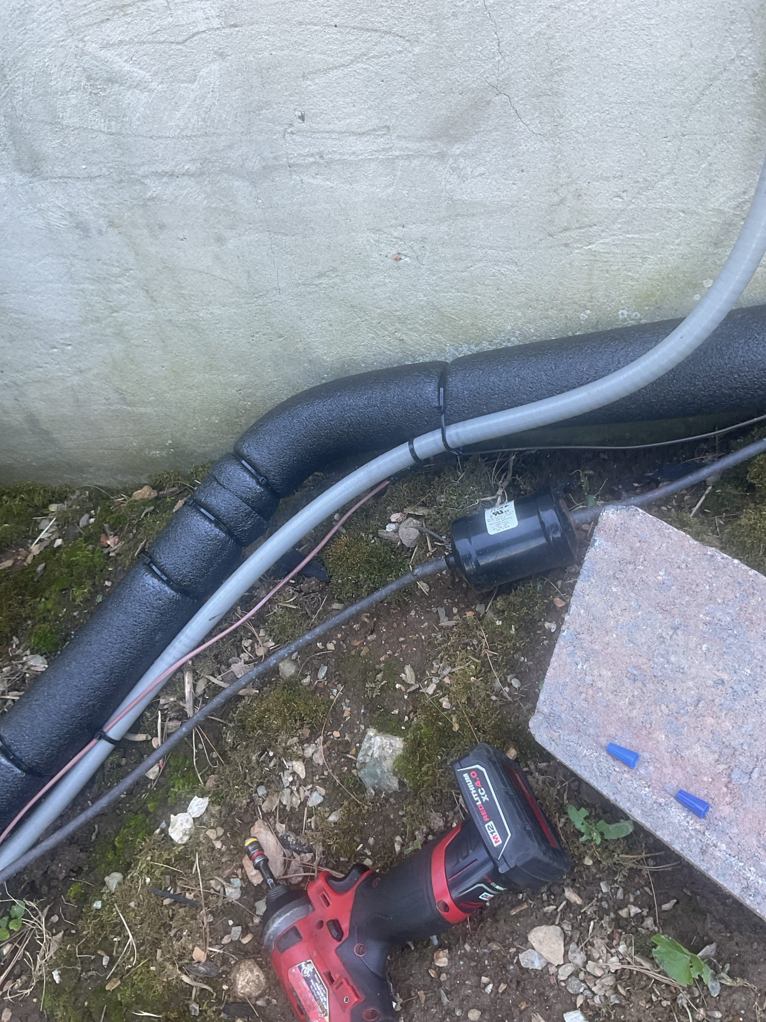 Luis 6-24-26
Repair low voltage wire. Cut low voltage wire and replace about 4 feet of thermostat wire, secure connections whir electrical tape. Test system operation ok. 