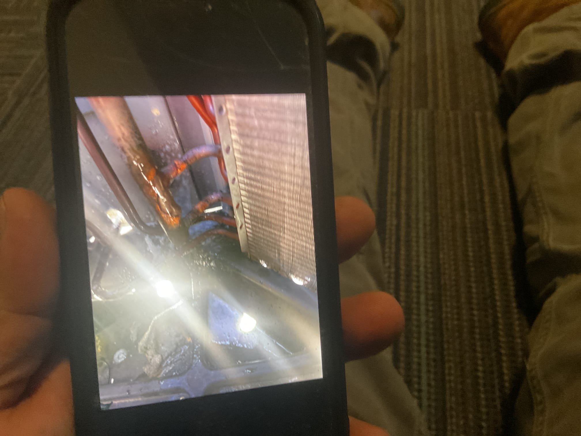 Will re braze broken joint at outdoor unit. Pressure tested system at 400 psi. Vacuum down system below 500 microns and re charge system using refrigerant from Atwater. 6//24/26. Repaired leak at condenser. Pressure tested 300 psi nitrogen. Vacuumed down system to 350 microns. Added in 7 lbs 410a. Refrigerant pressures were 310/134. Temp split was 17 degrees. Outdoor unit does vibrate a lot while running. A/c is working at time of service. 