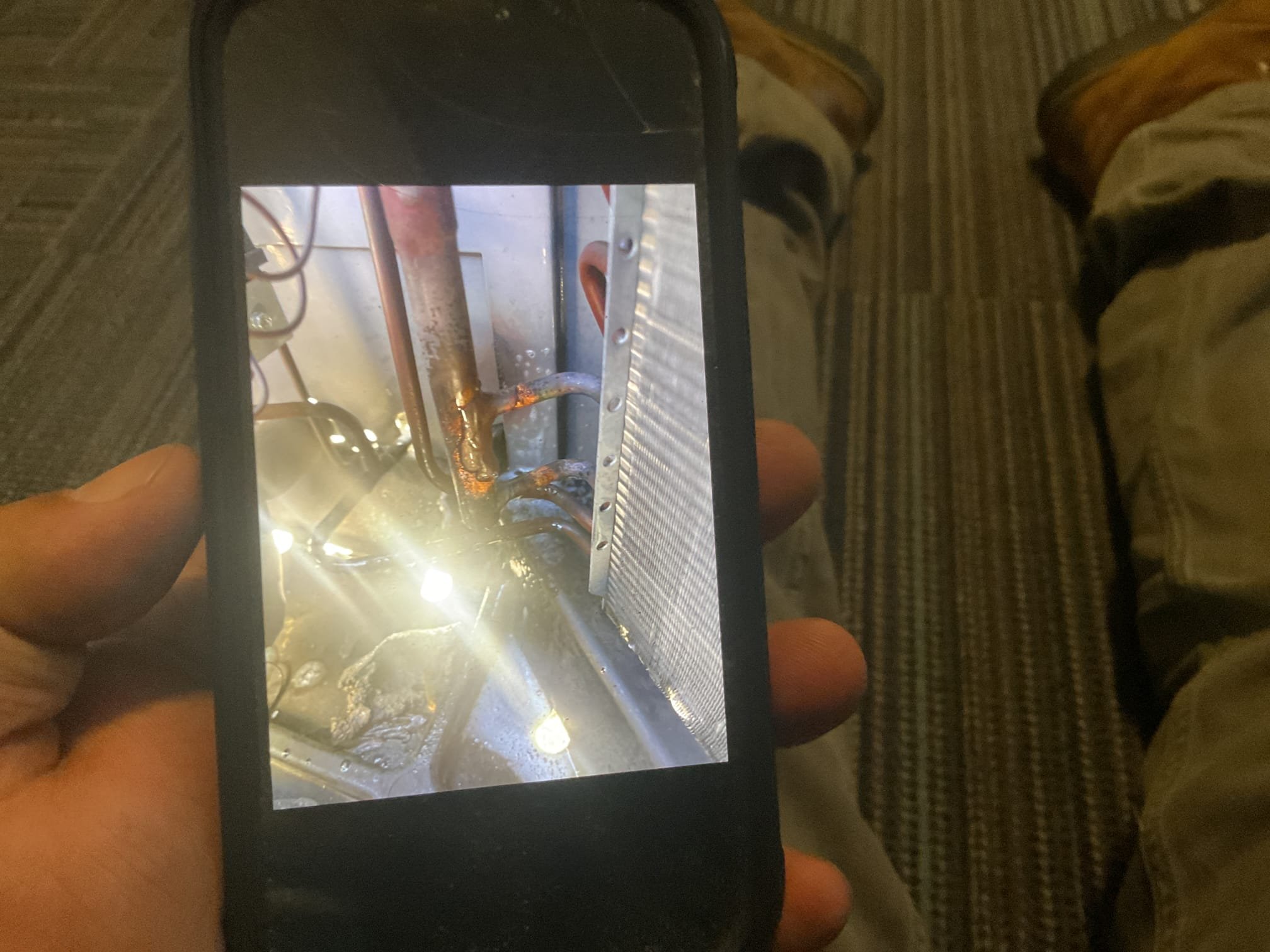 Will re braze broken joint at outdoor unit. Pressure tested system at 400 psi. Vacuum down system below 500 microns and re charge system using refrigerant from Atwater. 6//24/26. Repaired leak at condenser. Pressure tested 300 psi nitrogen. Vacuumed down system to 350 microns. Added in 7 lbs 410a. Refrigerant pressures were 310/134. Temp split was 17 degrees. Outdoor unit does vibrate a lot while running. A/c is working at time of service. 