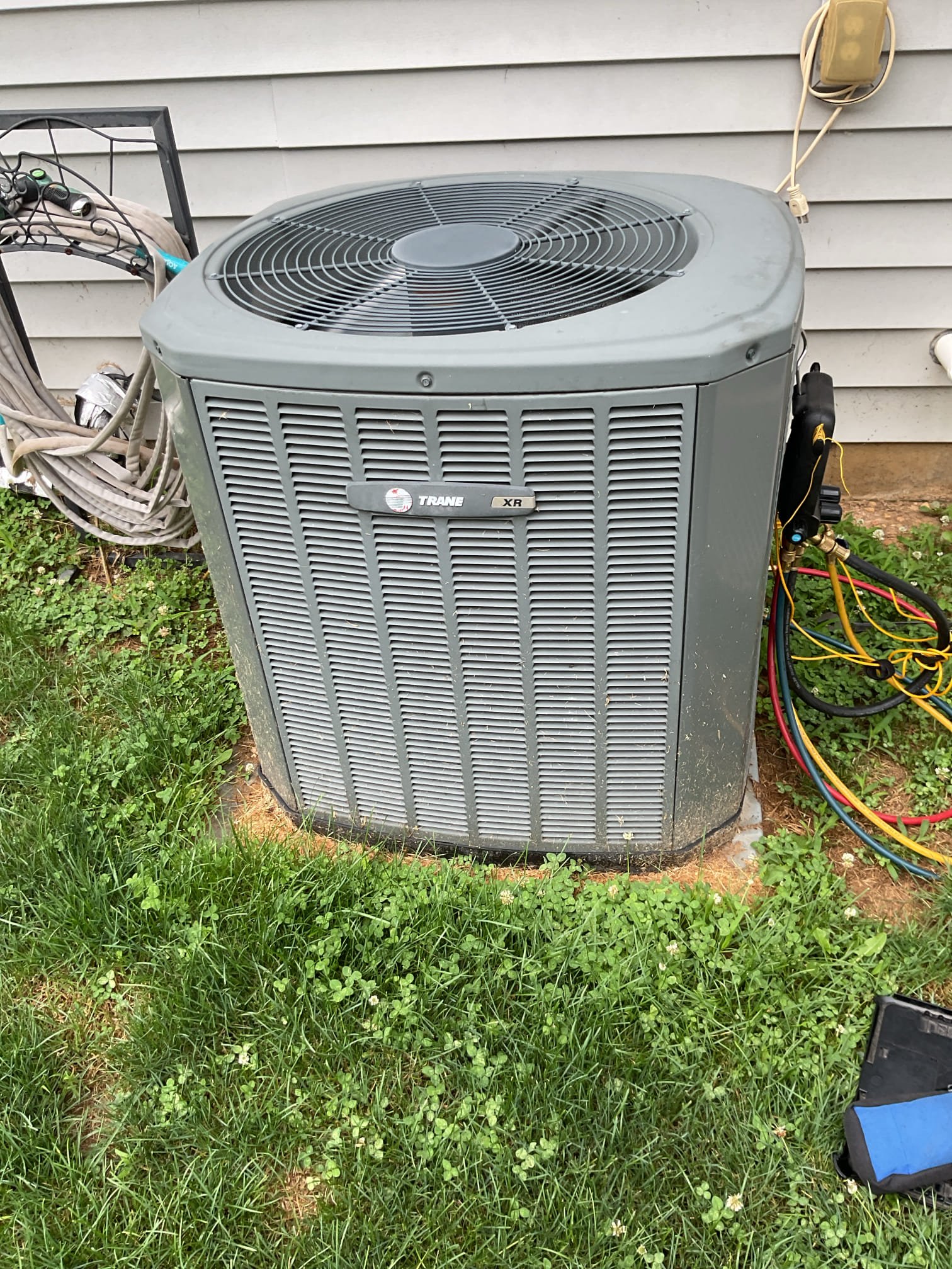 Completed AC tune up for 3 Ton Trane AC system
Equipment is Gas Furnace AC that dates to November 2016

-16x25x1 filter ok 
-Indoor and outdoor coils in good condition 
-Inspected wiring, controls, electric motors and components; left estimates for surge protectors 
-Measured temperature split (69-49=20°) and static pressure 
-Inspected drains; provided estimate for drain pan overfill safety switch and an estimate for a WiFi flood prevention monitor. If water is detected on floors near indoor equipment this monitor will shut equipment down
-Checked integrity of compressor motor (mega ohm test)

-Assessed refrigerant charge checked pressures. 12° Subcooling: Good

*Also provided estimate for APCOX whole home air treatment system UVC light keeps biological growth at bay and catalyst controls odors and VOCs. Lifetime warranty on the system. Replace UV bulb every 3 years. 

AC system operating well at this time. It is 10 years old which is considered the average lifespan of a forced air HV